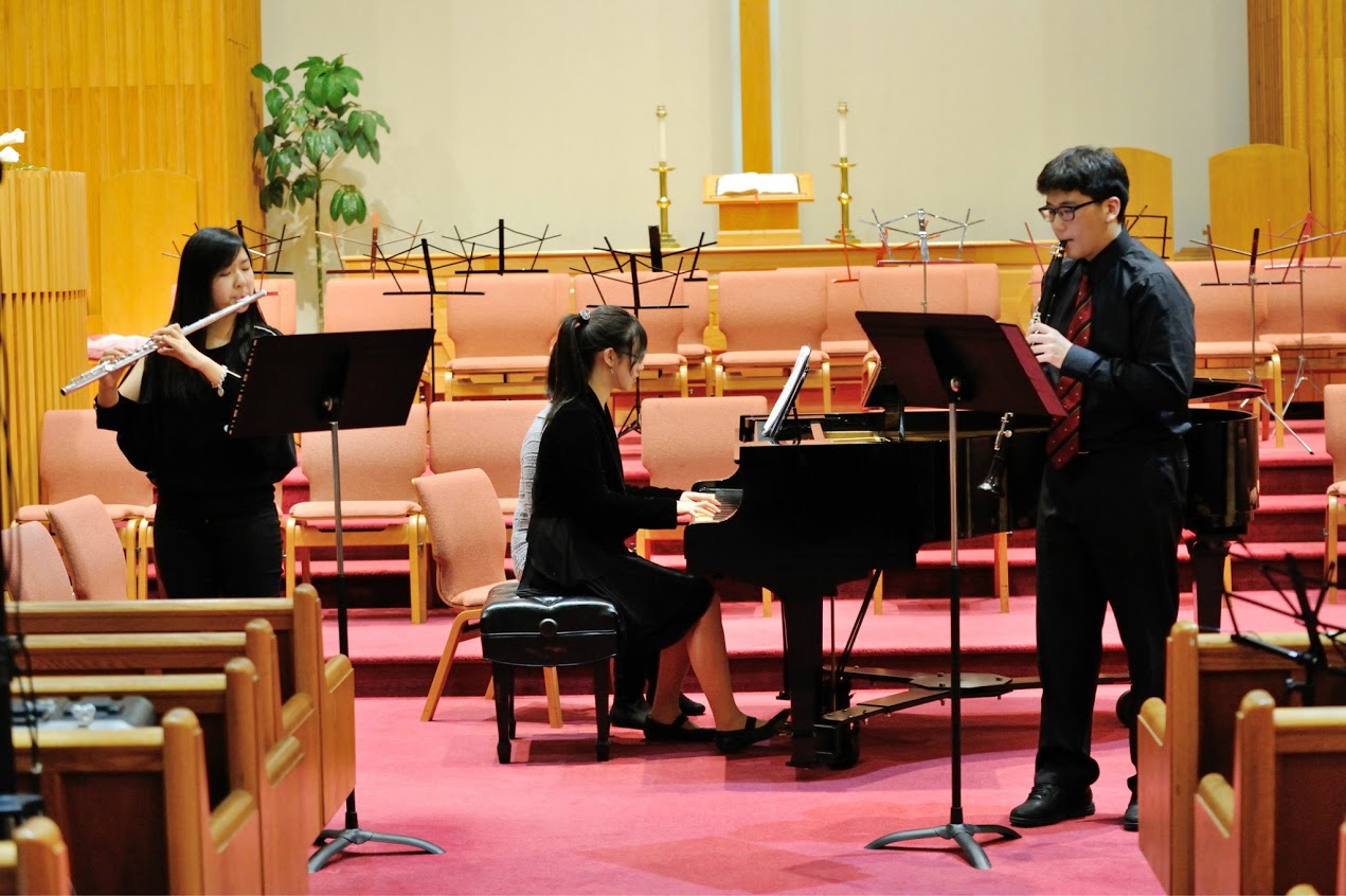 Wind and piano trio performing Saint-Saens Tarentella