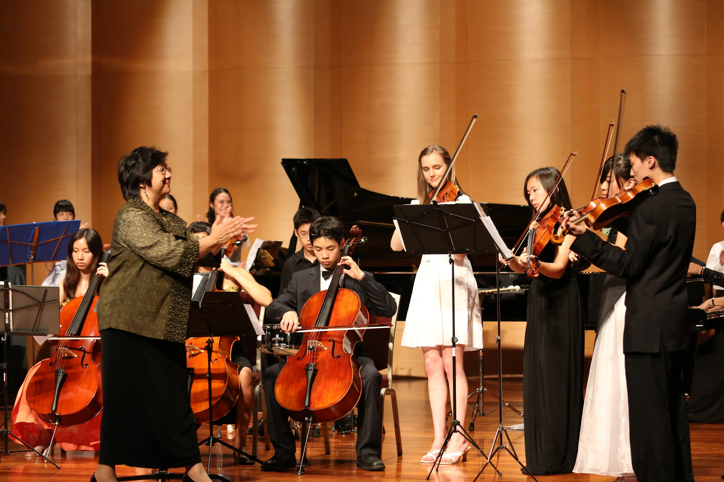 Ms. Lin pushing the orchestra forward