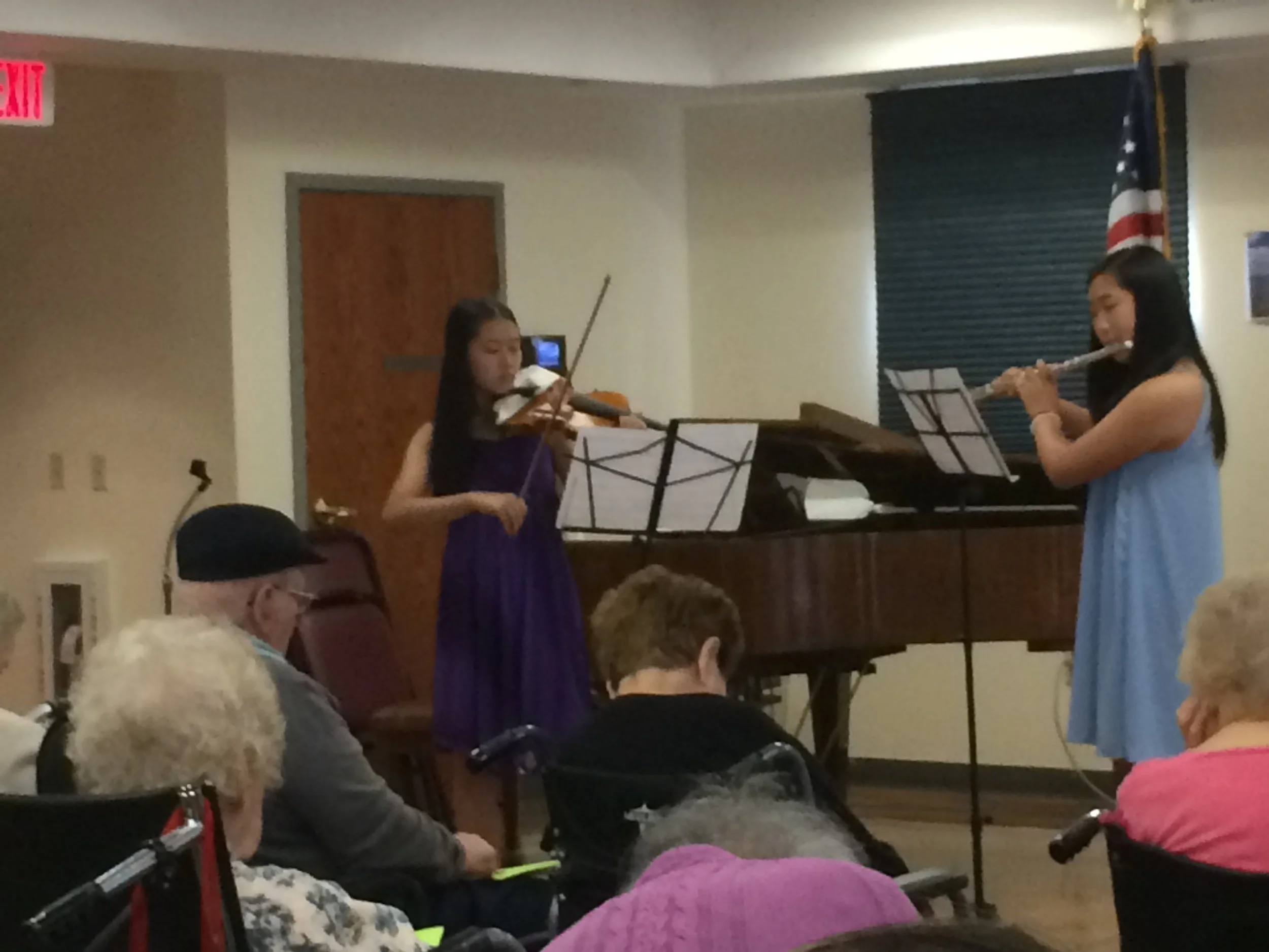 Steve Wang, Catherine Cai, and May Lee perform the Suk Bagatelle