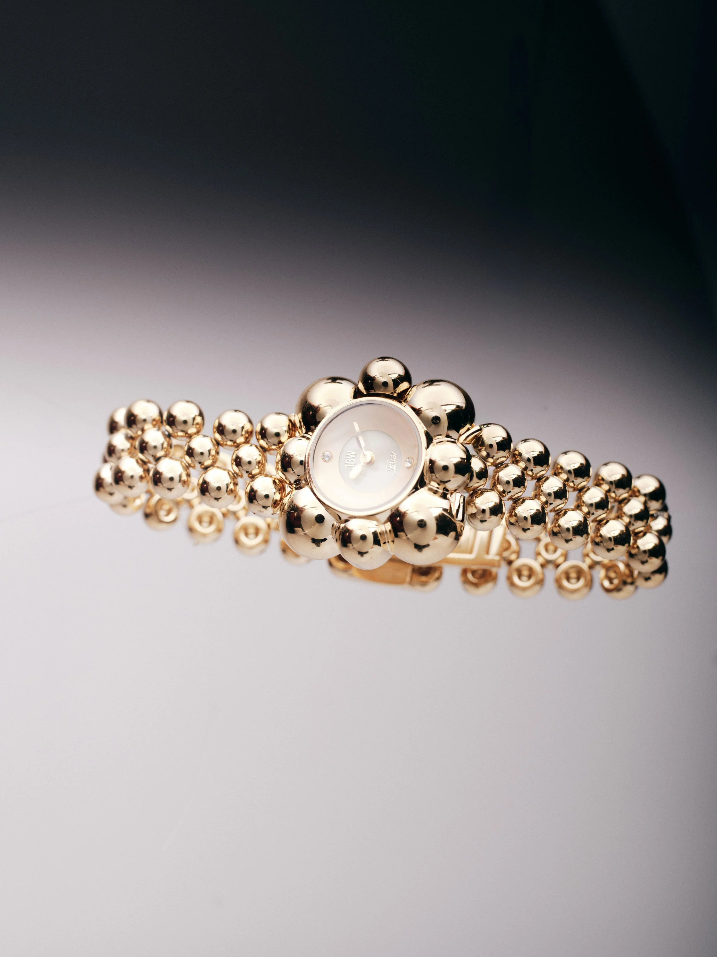 jbw-atmosphere-j6405a-gold-diamond-watch-spring-april-2025.jpg