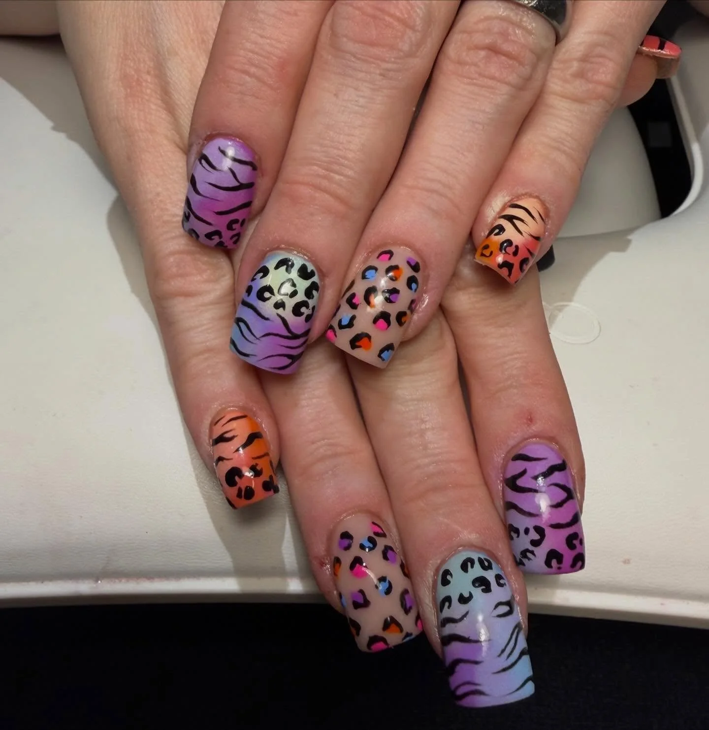 One of my favorite sets yet by Madi!!! Lisa Frank inspired! 🤩💅
Follow @madisonrosenails04 if you love to see fun nail designs! 

#binghamtonnailtech #nailtech #naildesigns #binghamtonsalon
