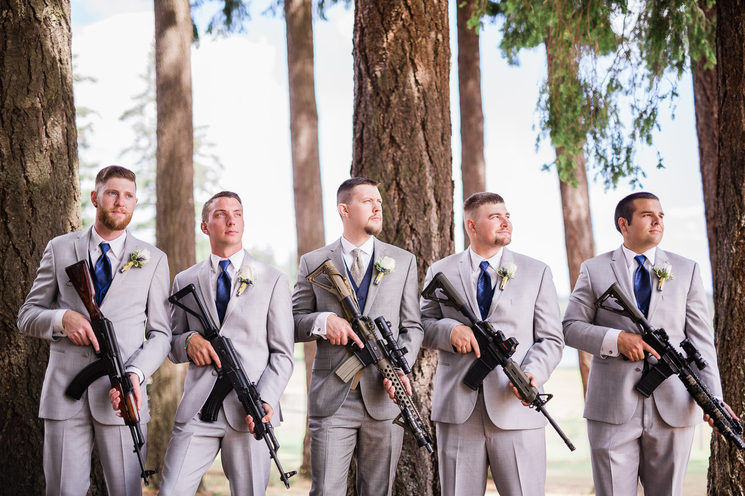 Groomsmen with rifles