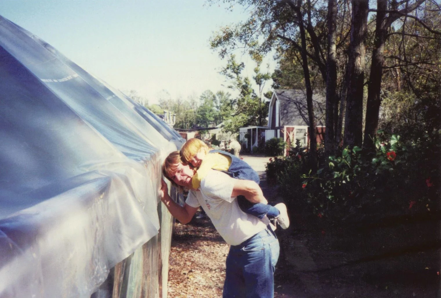 lindsay and dad greenhouse.jpeg