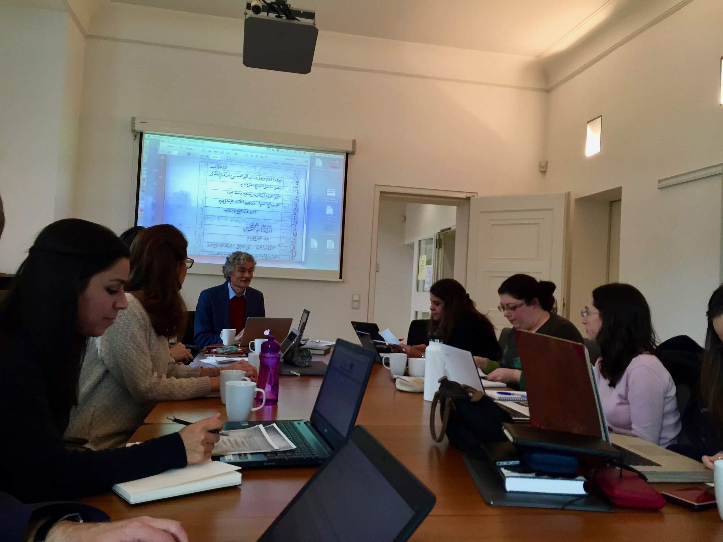 Professor Daniel Martin Varisco leading discussions of one of the Rasulid texts examined during a breakout session. 