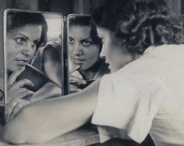 Ada in the folding mirror