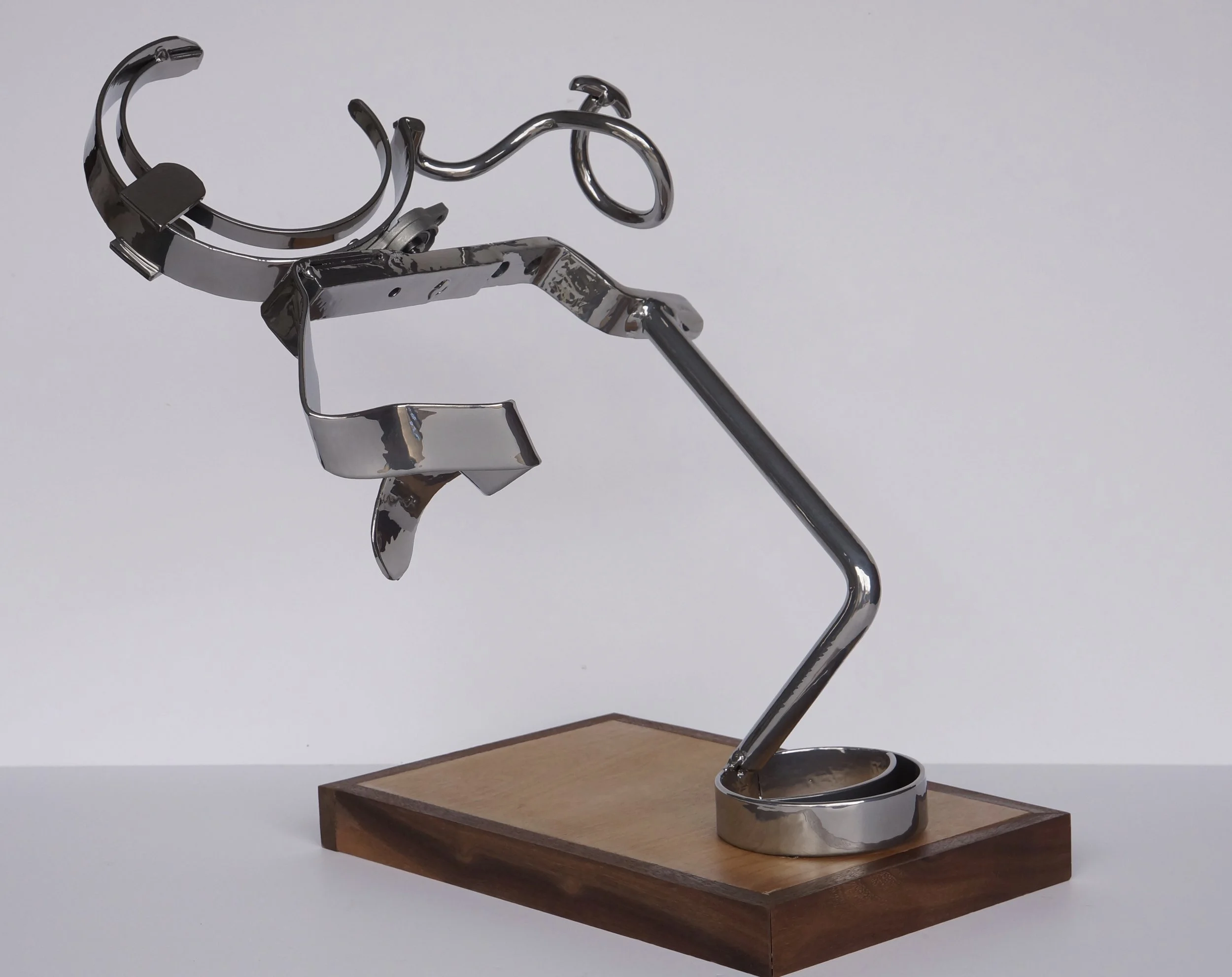  Height - 16 inches  Width - 14 inches  Length - 13.5 inches  steel, wood base  Created in 2018 