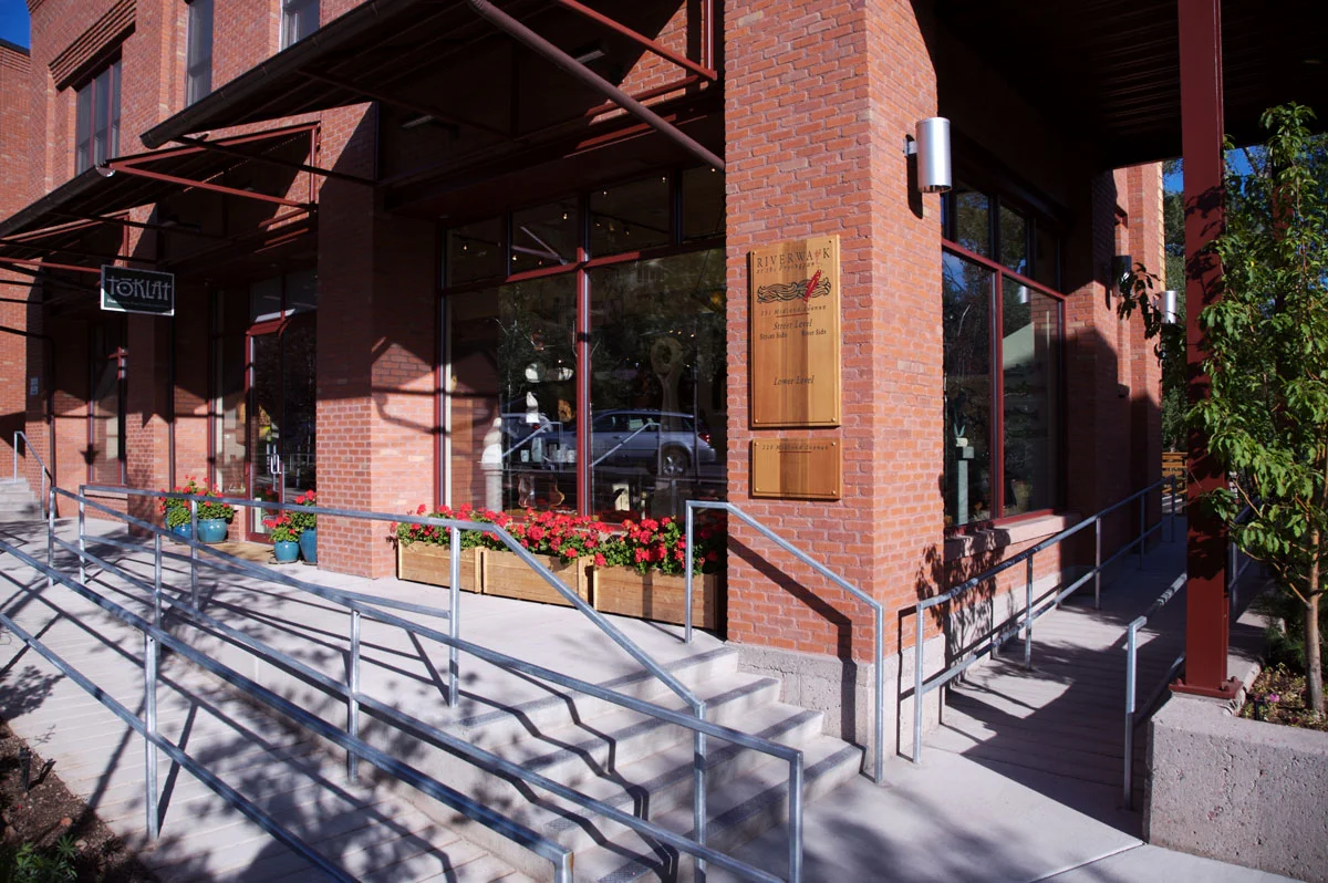 The carefully designed storefronts cater to the pedestrian scale