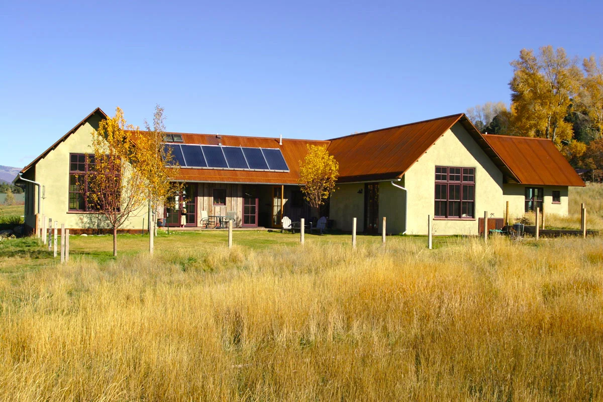 This straw bale house centers around an open south-facing courtyard