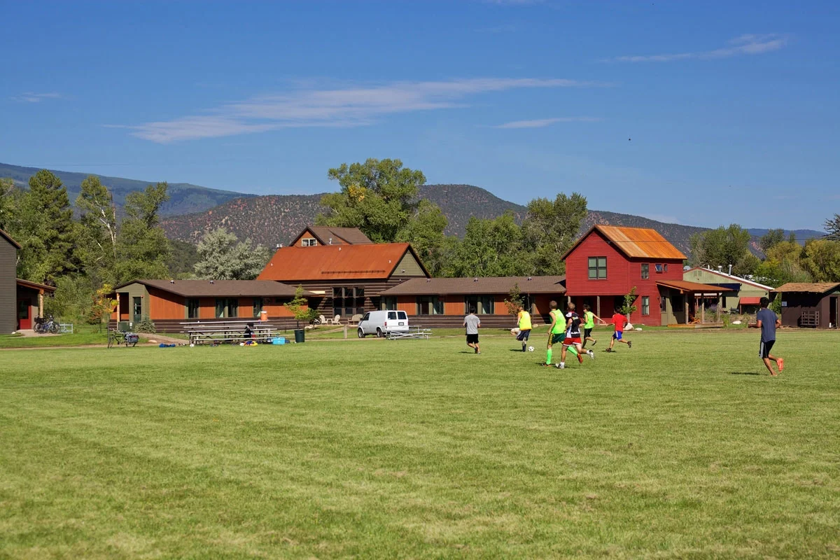 The north dorm addresses the soccer field to the east