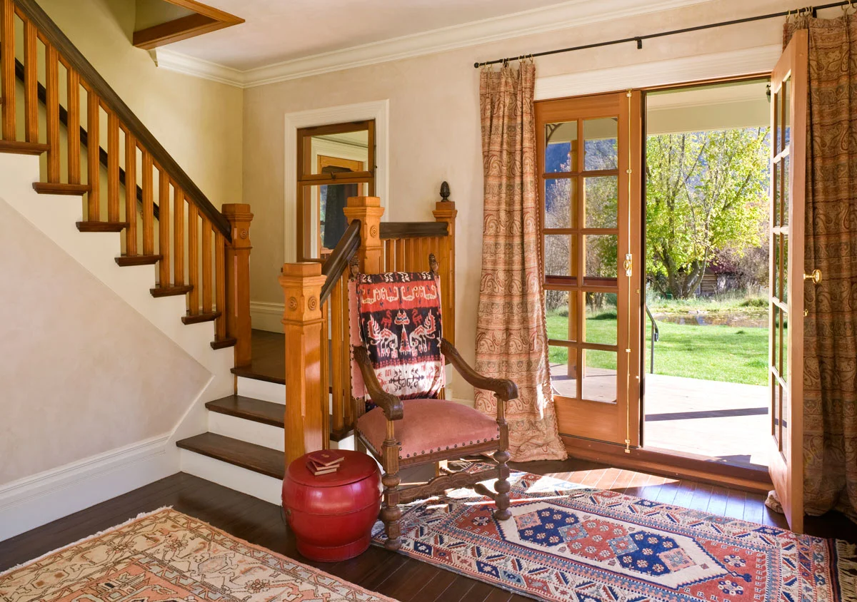 The living room opens out toward the pond