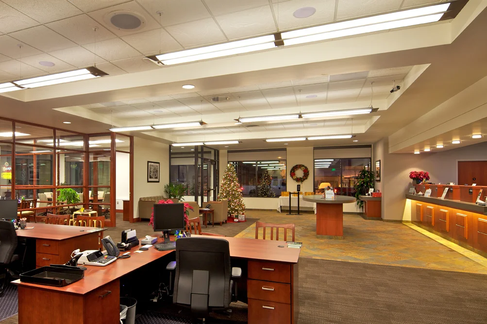The main floor of the bank with the tellers' desk on the right