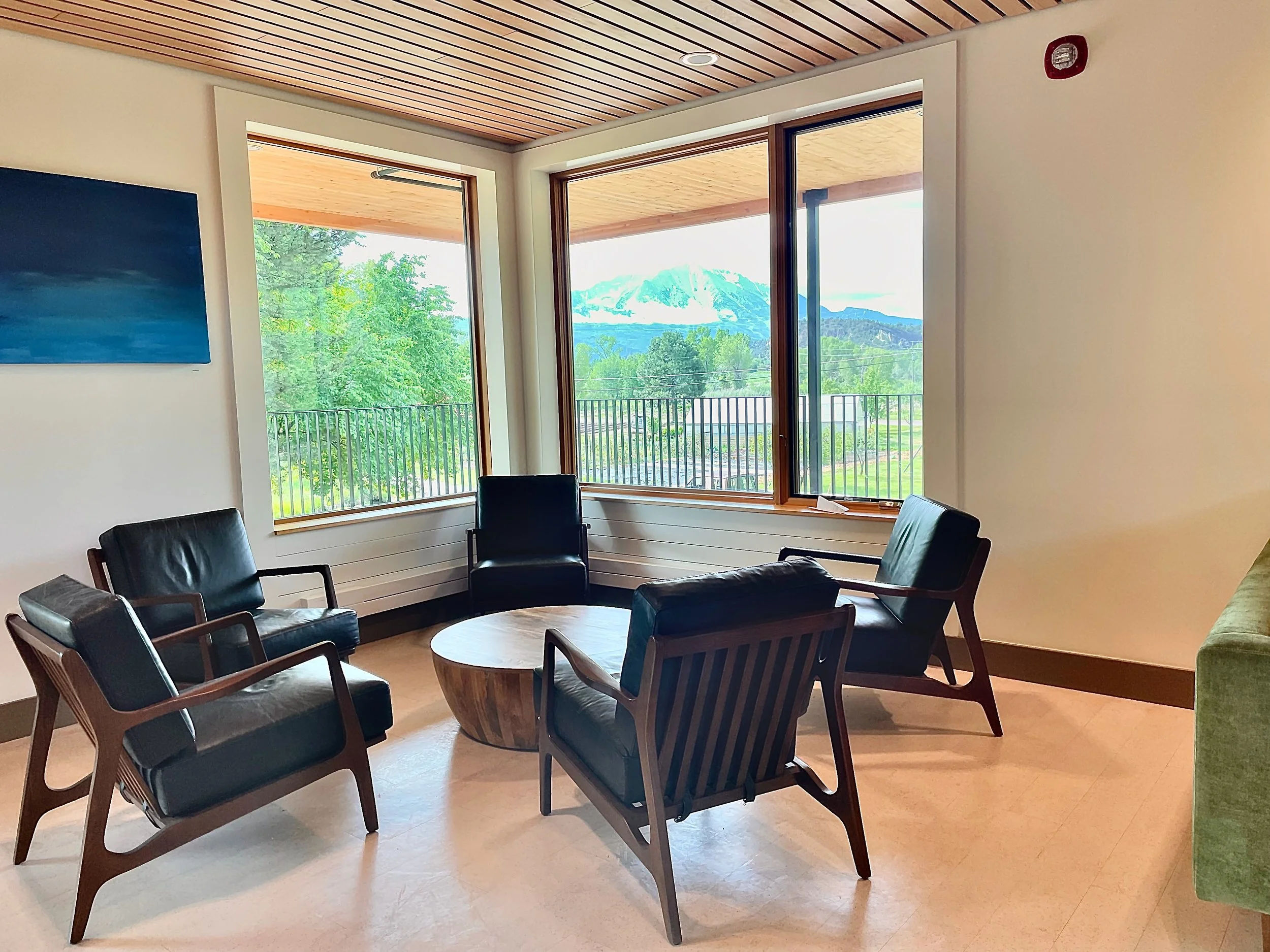  The upstairs mezzanine offers more relaxed seating options and views out towards Mount Sopris and the CRMS Organic Garden.  