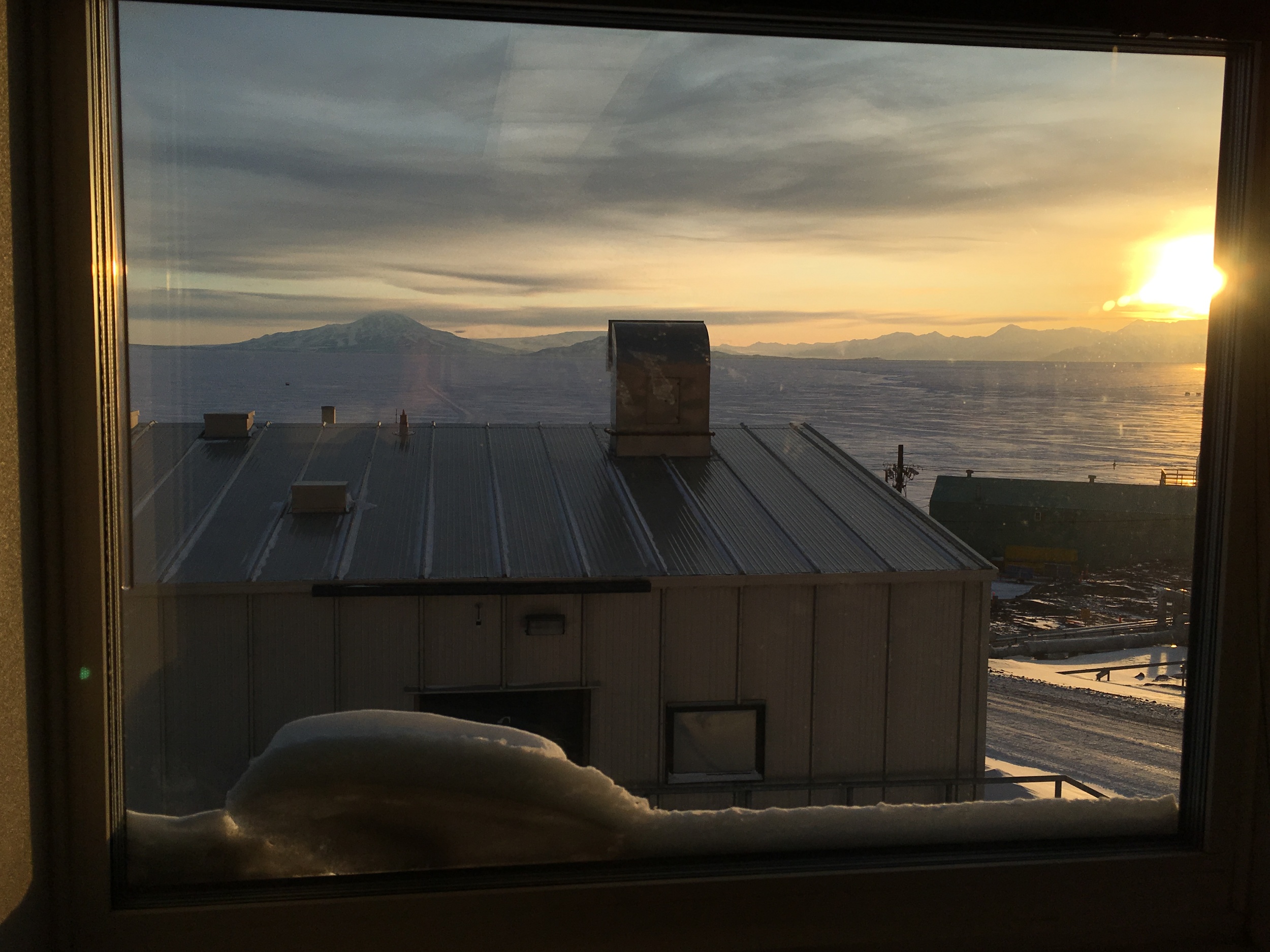  McMurdo Sound, Mt. Discovery, and the Royal Society Range viewed out the window of our lab in the Crary building.&nbsp; The last sunset of the year is on Saturday Oct. 24th at 1:09 AM, after which we will have 24-hour sunlight. 