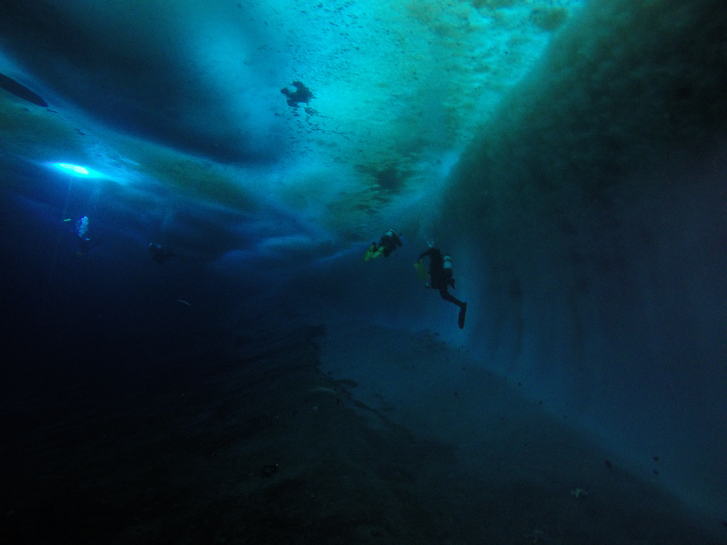  Divers near the ice wall at New Harbor. 