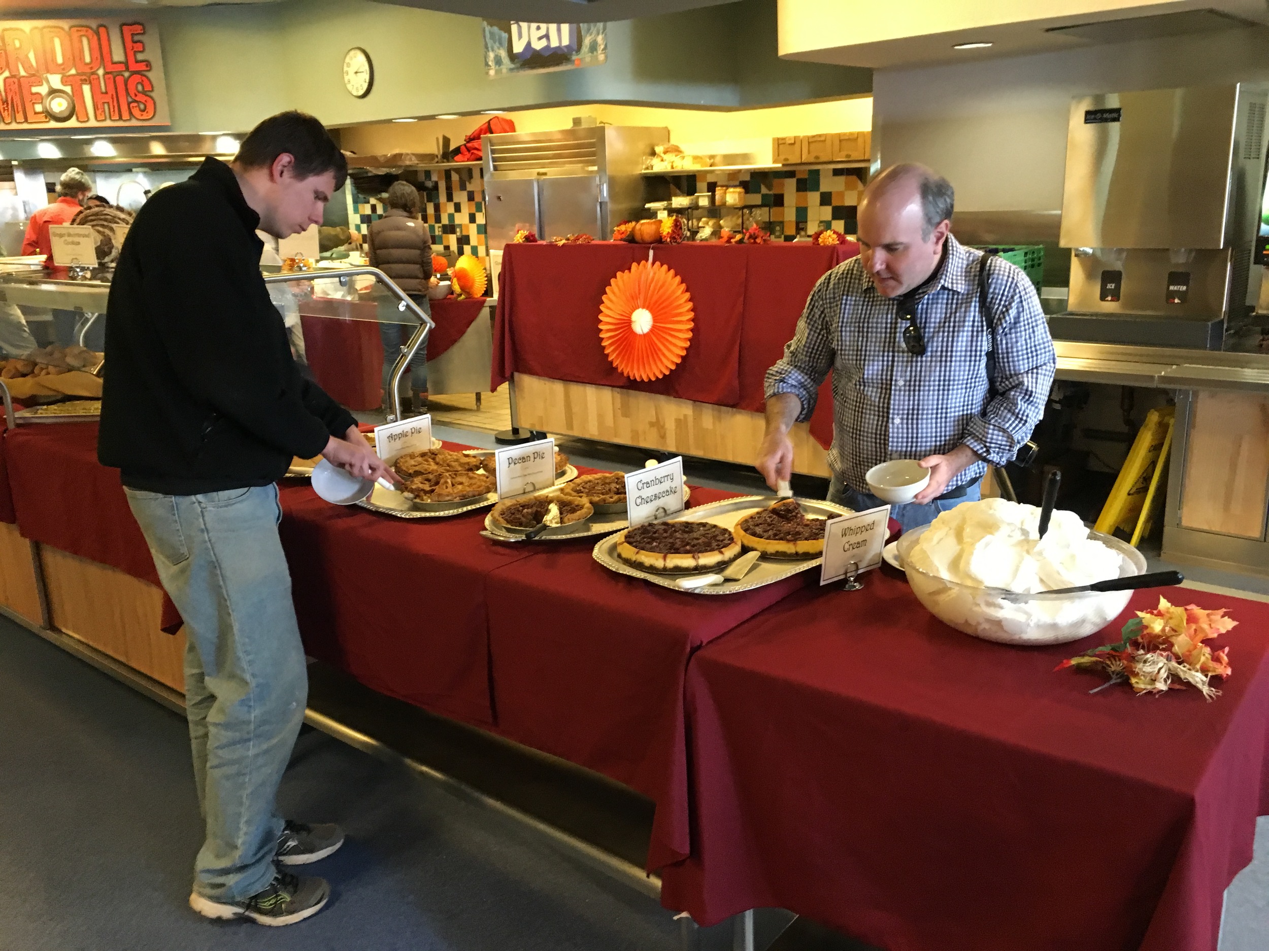  Steve samples the pies at Thanksgiving Dinner in the galley. 