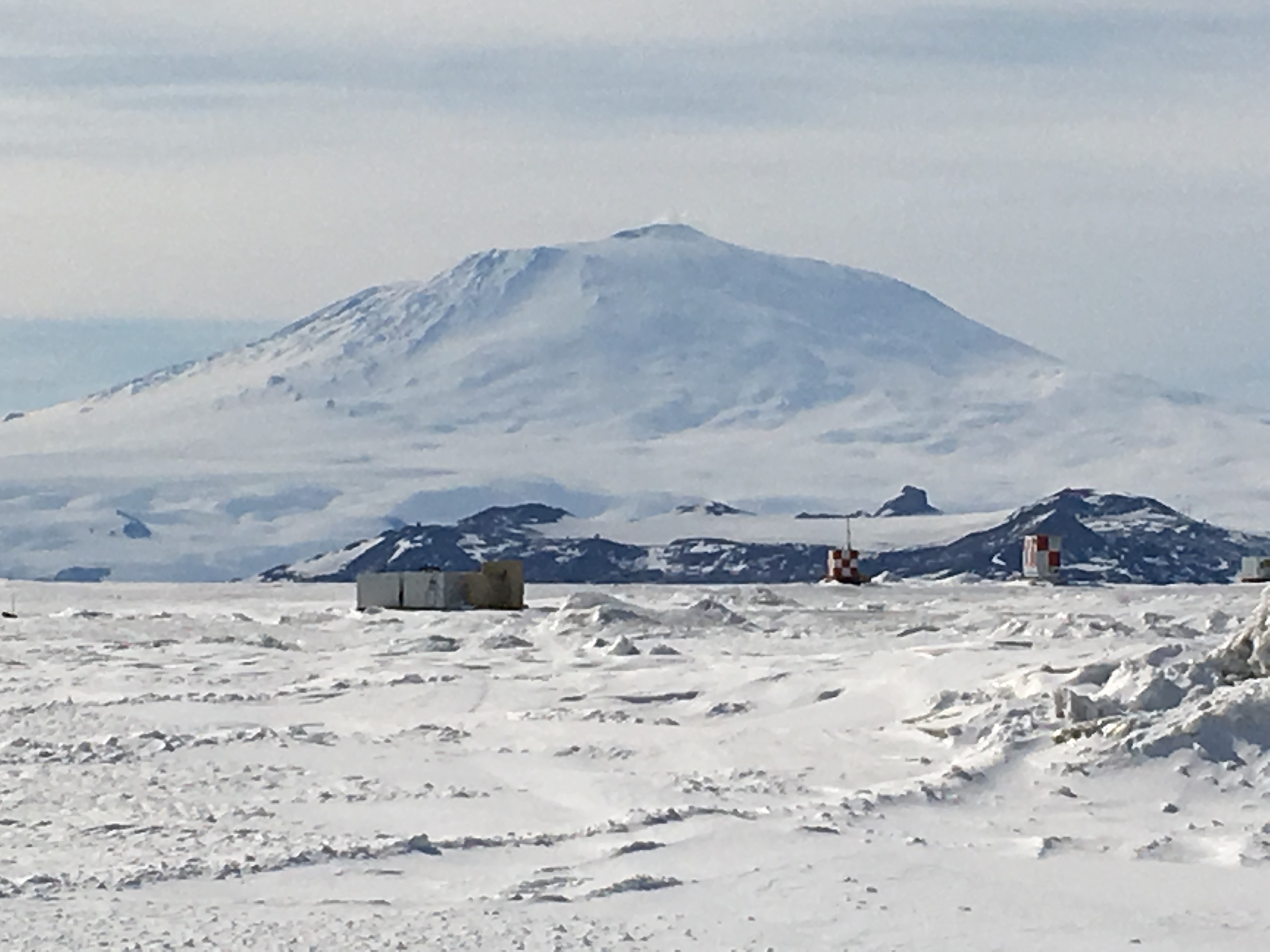  View of Mt. Erebus, the world's southernmost active volcano, with Pegasus Field (one of the two McMurdo airstrips) in the foreground. 