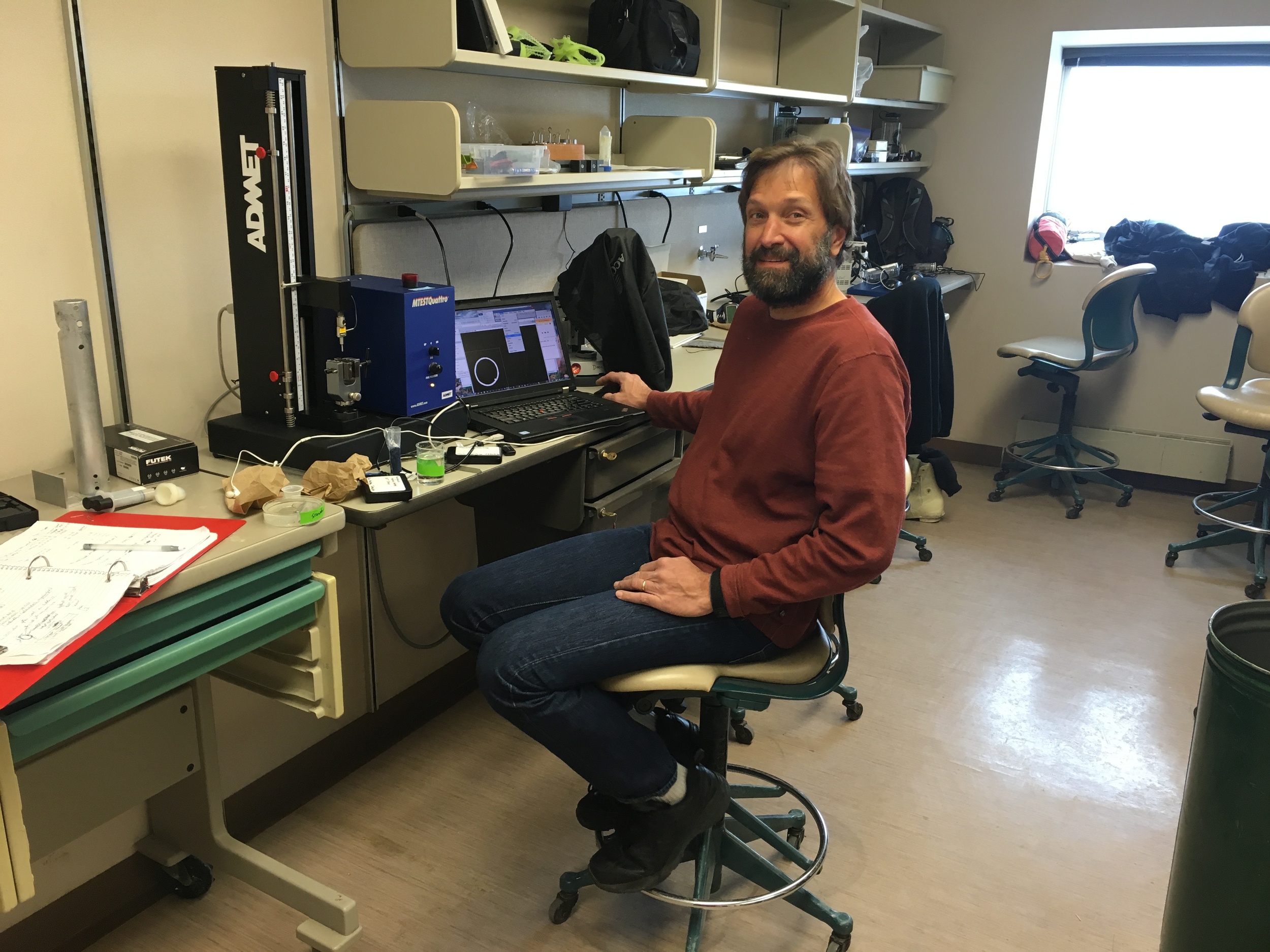  Bret in the lab working with the materials tester.&nbsp; How strong are a sea spider's legs? 