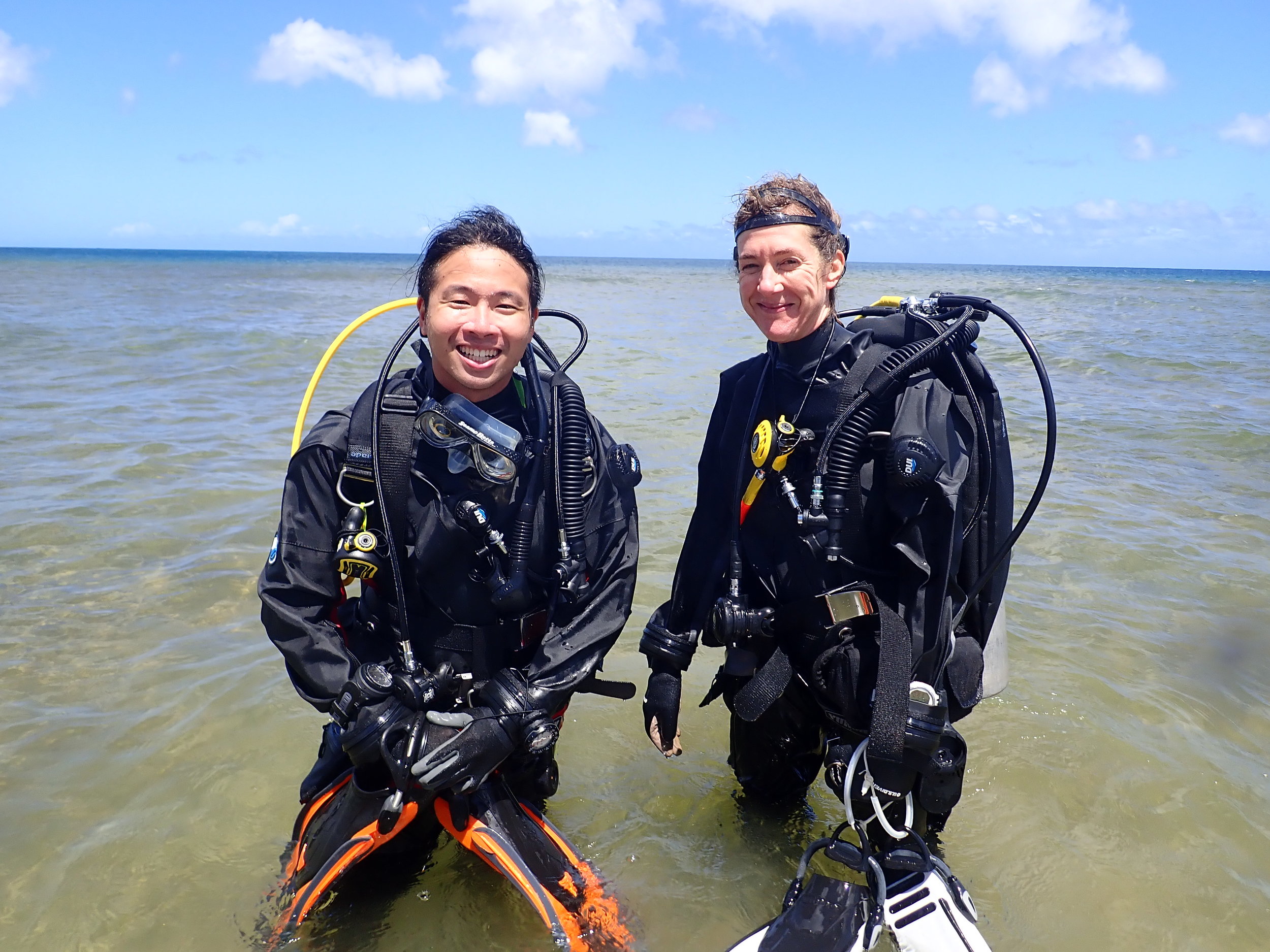 Aaron and Amy on the North Shore of O'ahu, Hawai'i, training in their Antarctic gear.