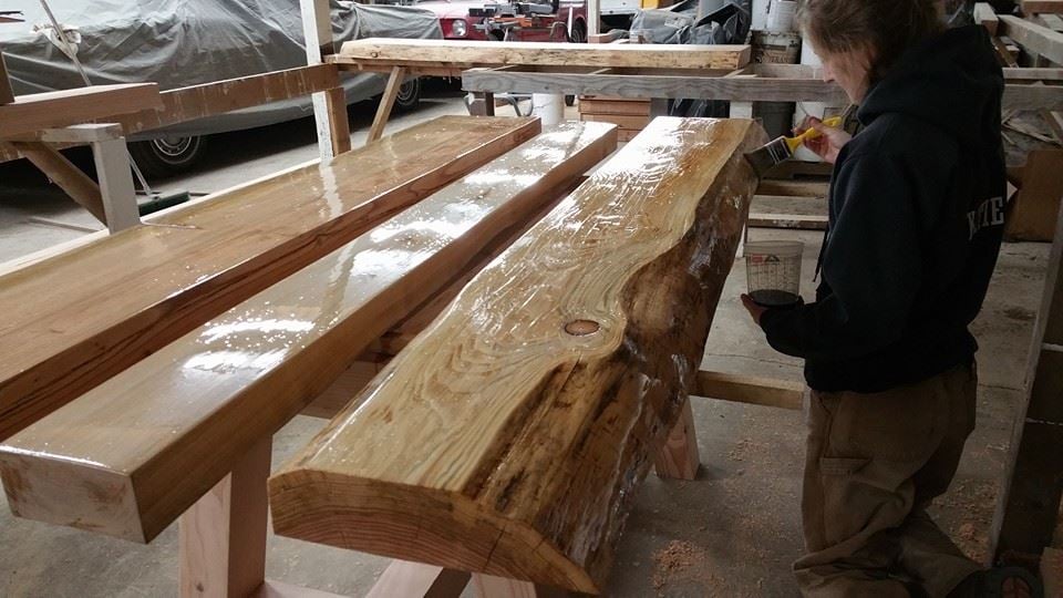  This was one of my favorite projects. This is a desk or meeting table for my cousin's office. The two outside slabs are Douglas Fir, but the middle board is Maple. We have never worked with Maple before, so it was especially exciting to see how it l