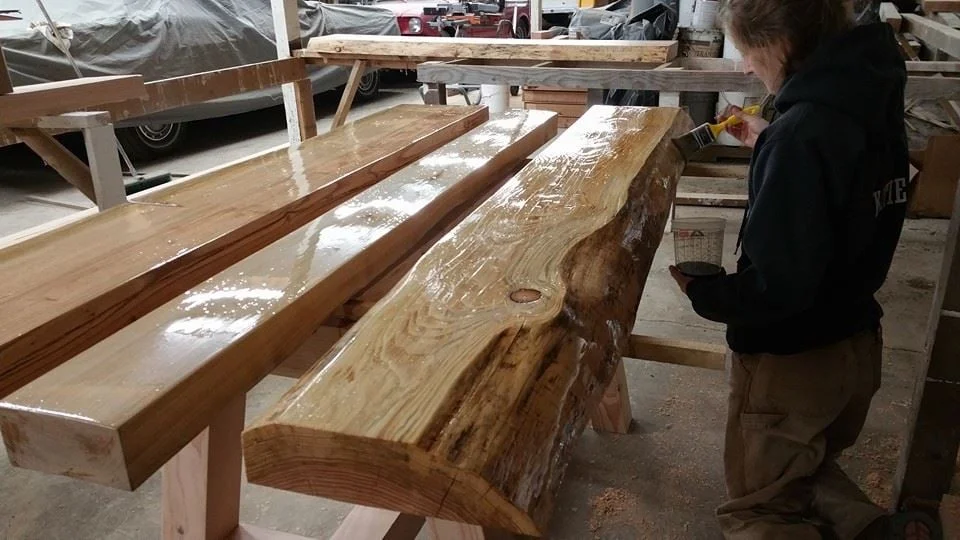 This was one of my favorite projects. This is a desk or meeting table for my cousin's office. The two outside slabs are Douglas Fir, but the middle board is Maple. We have never worked with Maple before, so it was especially exciting to see how it looked after it was stained. The contrast between the woods turned out to be absolutly beautiful.