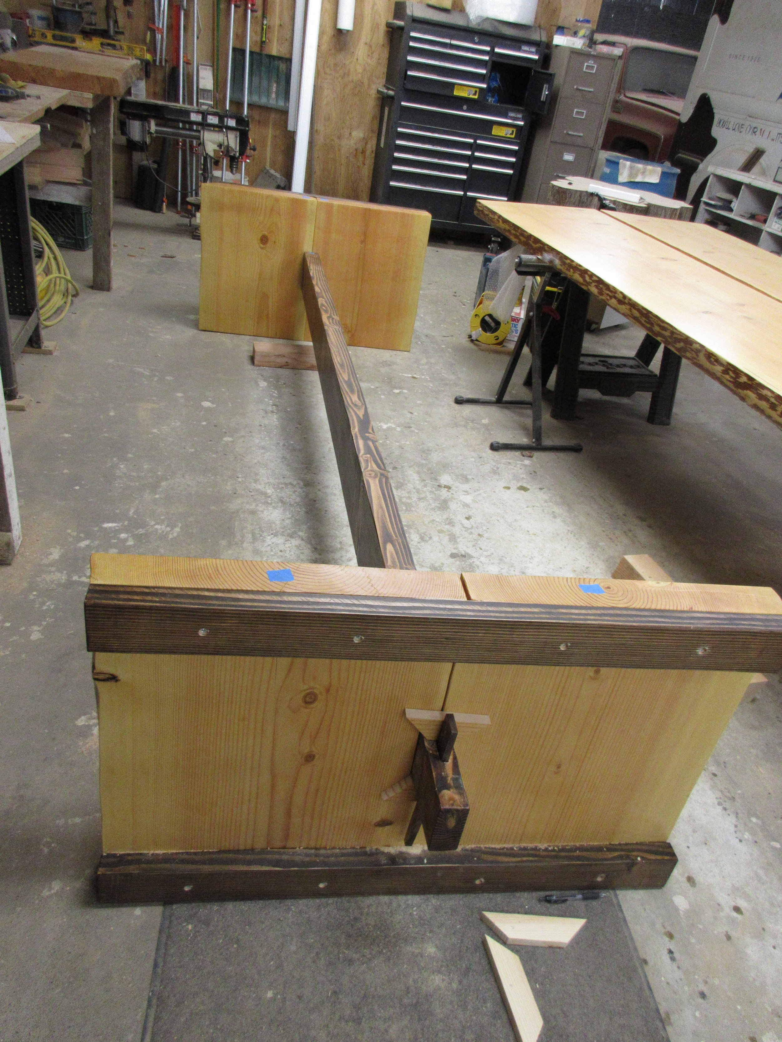  This is what the frame of the conference table looks like. I especially appreciate the way the dark wood compliments the lighter wood. 