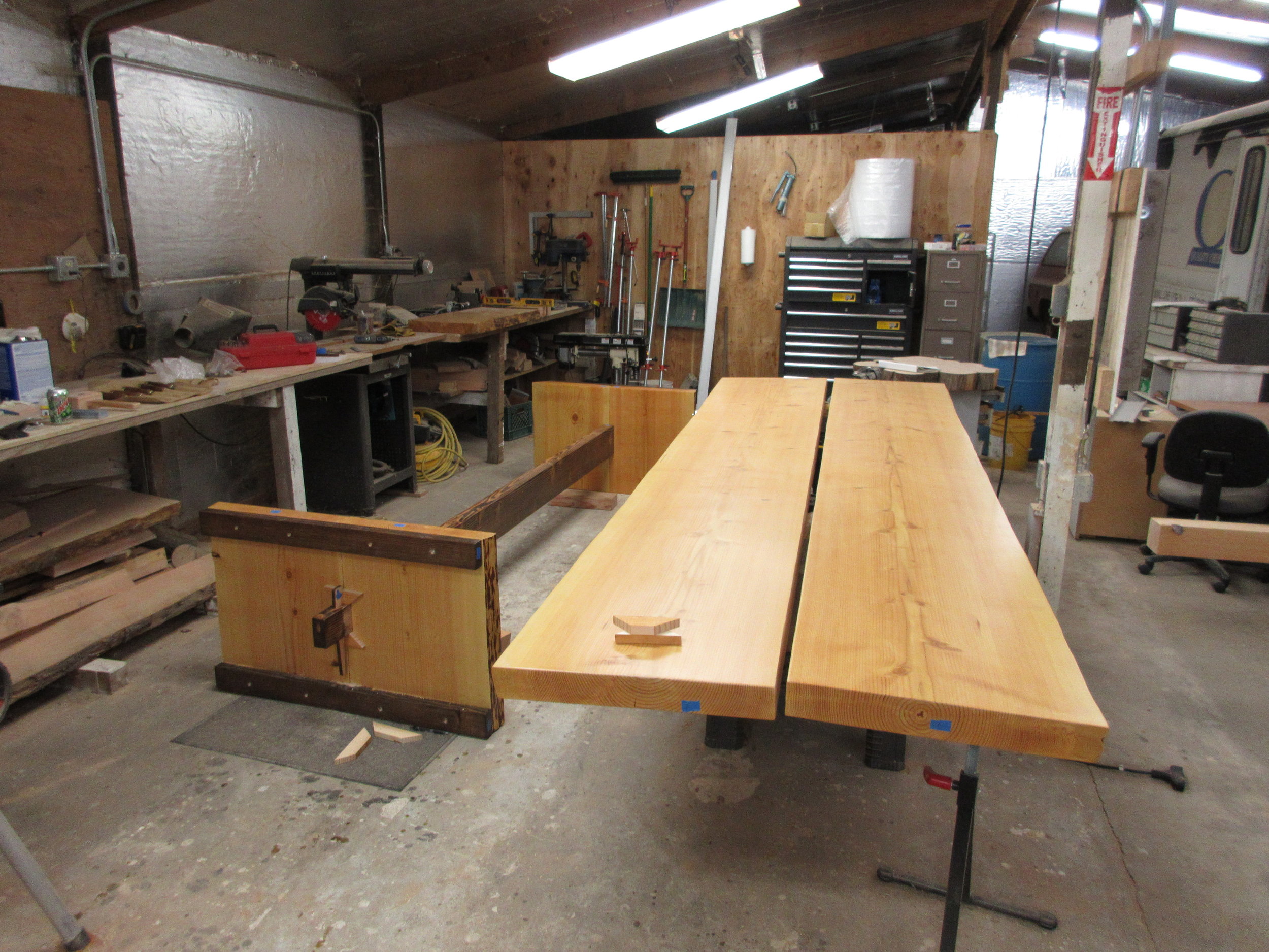  This is the undercarriage and the table slabs sitting side-by-side. Suddenly, our shop seemed a little small... 