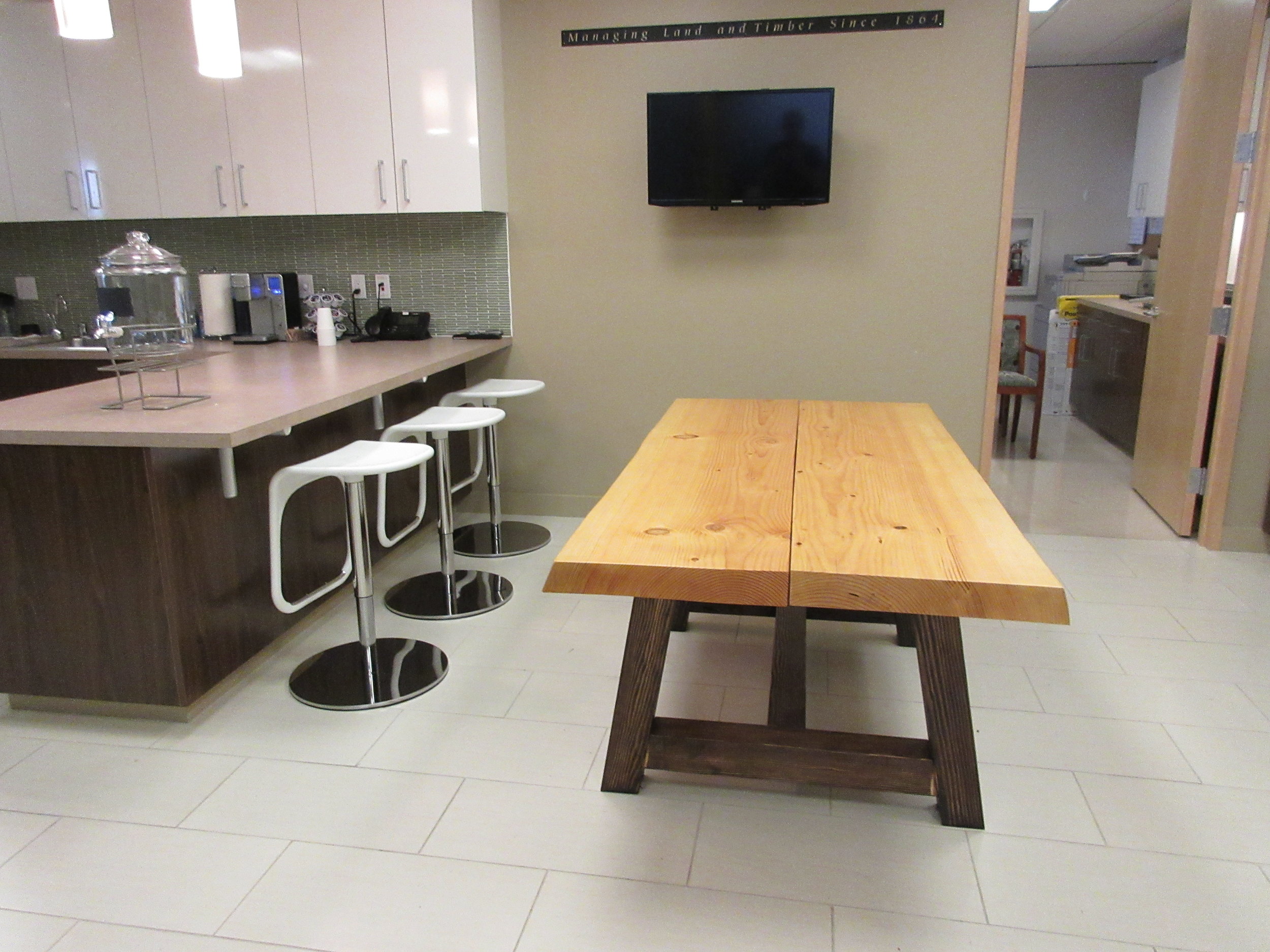  This is the kitchen table we made as well. I love the way the table contrasts with the modern look of the kitchen. These tables now seem so small compared with the conference table!! 