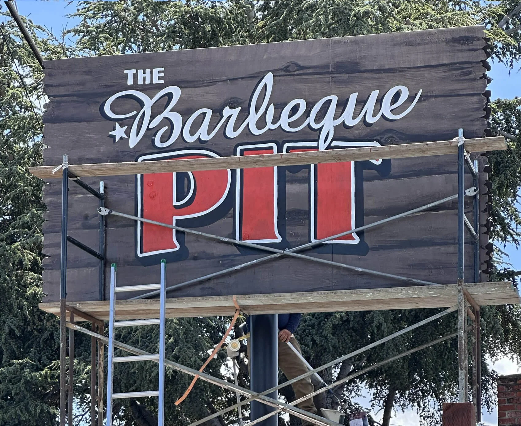 BBQ Pit sign on aluminum faux wood painted sign 2025