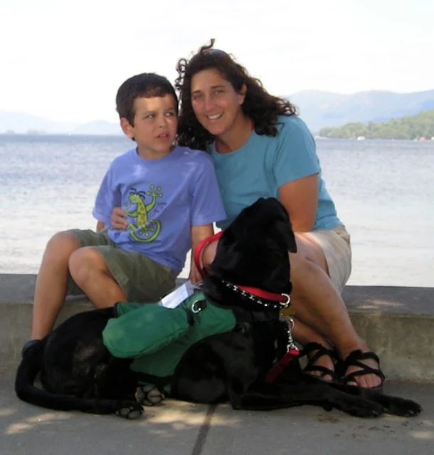 Duncan, Louie and his Mom sitting next to the lake in vermont