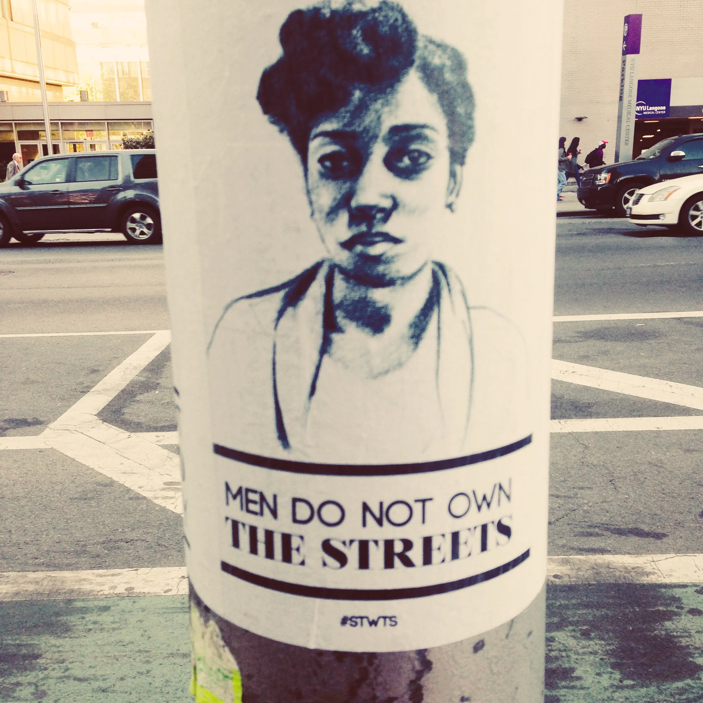 An example of the "Stop Telling Women To Smile" series: Street Sign 2 by Jeffrey Zeldman is licensed under CC BY 2.0.