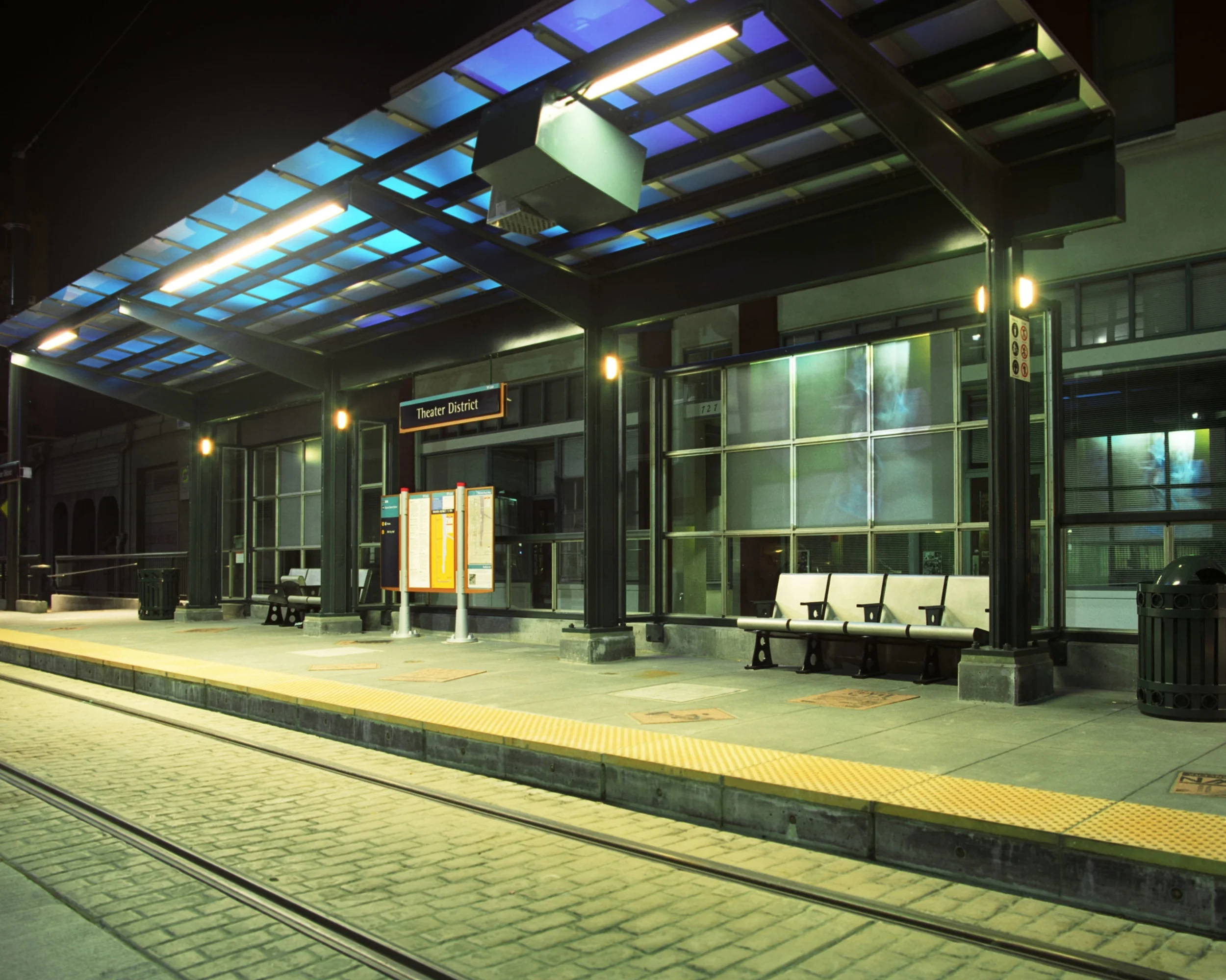 ART was selected to provide design services for the Light Rail, Northern Terminal Passenger Station. This particular station is located in the City's Theater District and the station design and associated artwork reflect the surroundings. Theater-style seats, an array of overhead theater lights and reproduced playbills scattered in the concrete platform were part of Phase One of this project. The $380,000 construction cost matches ART's estimate as well as the contractor's bid. OTAK managed the overall system design process for Sound Transit.
