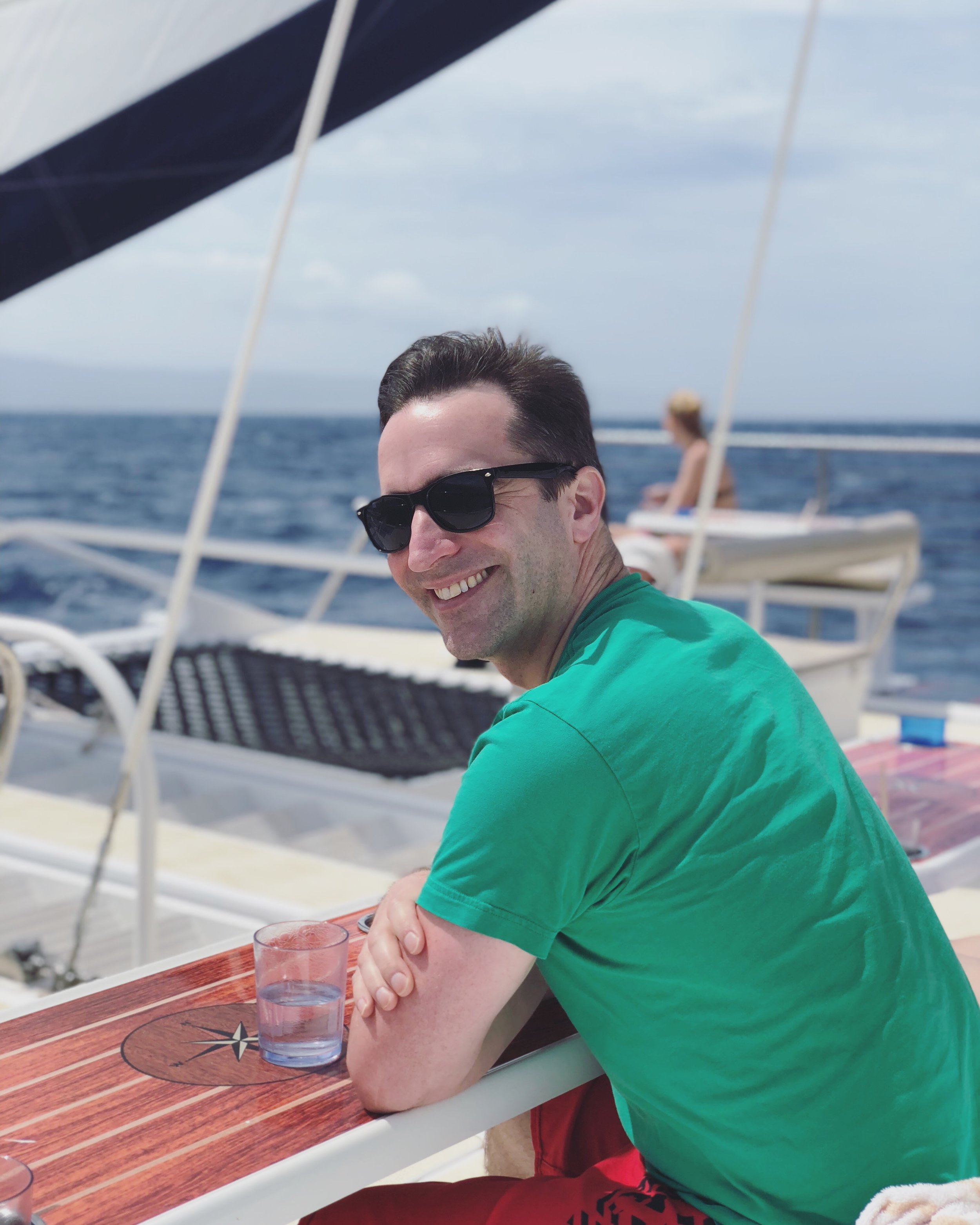 Warm sun and an ocean breeze as we raise the sail on our journey back to port 