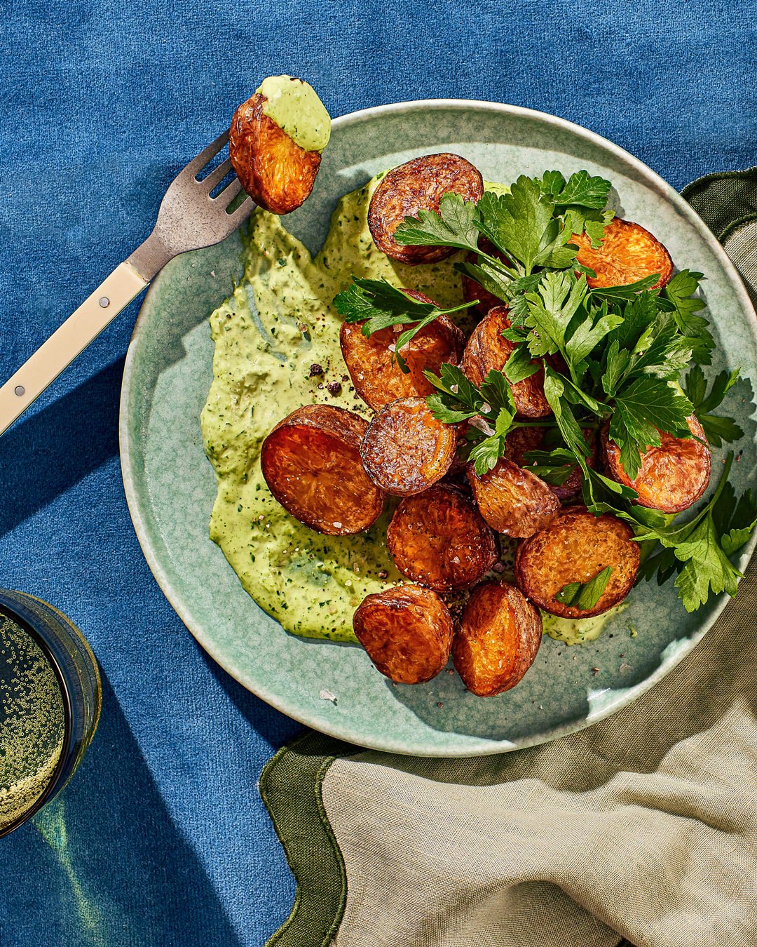 Commercial photography of a plate of roasted potatoes