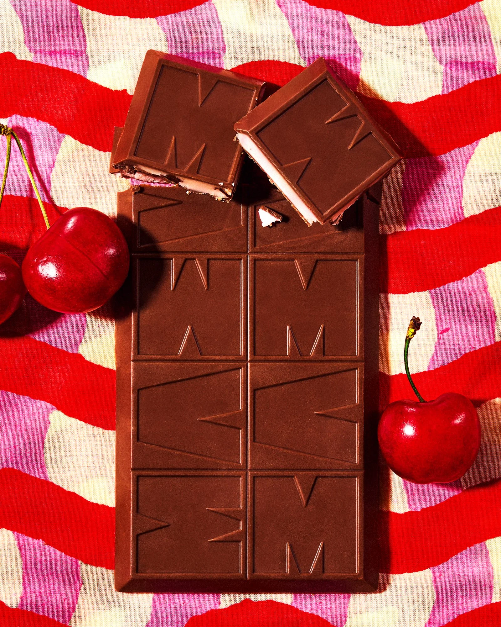 commercial brand food product photo of a cherry chocolate bar / shot by commercial food photographer Ali Redmond