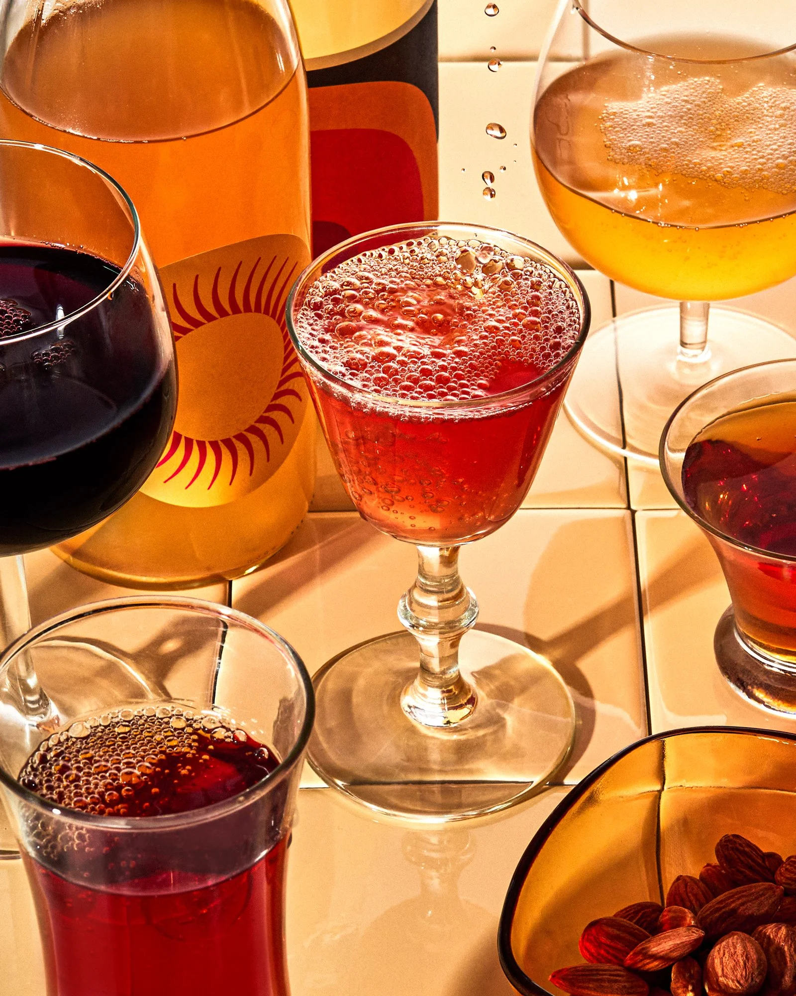 Commercial product photography of a collection of wine glasses with different varietals shot by Food and Beverage Photographer Ali Redmond