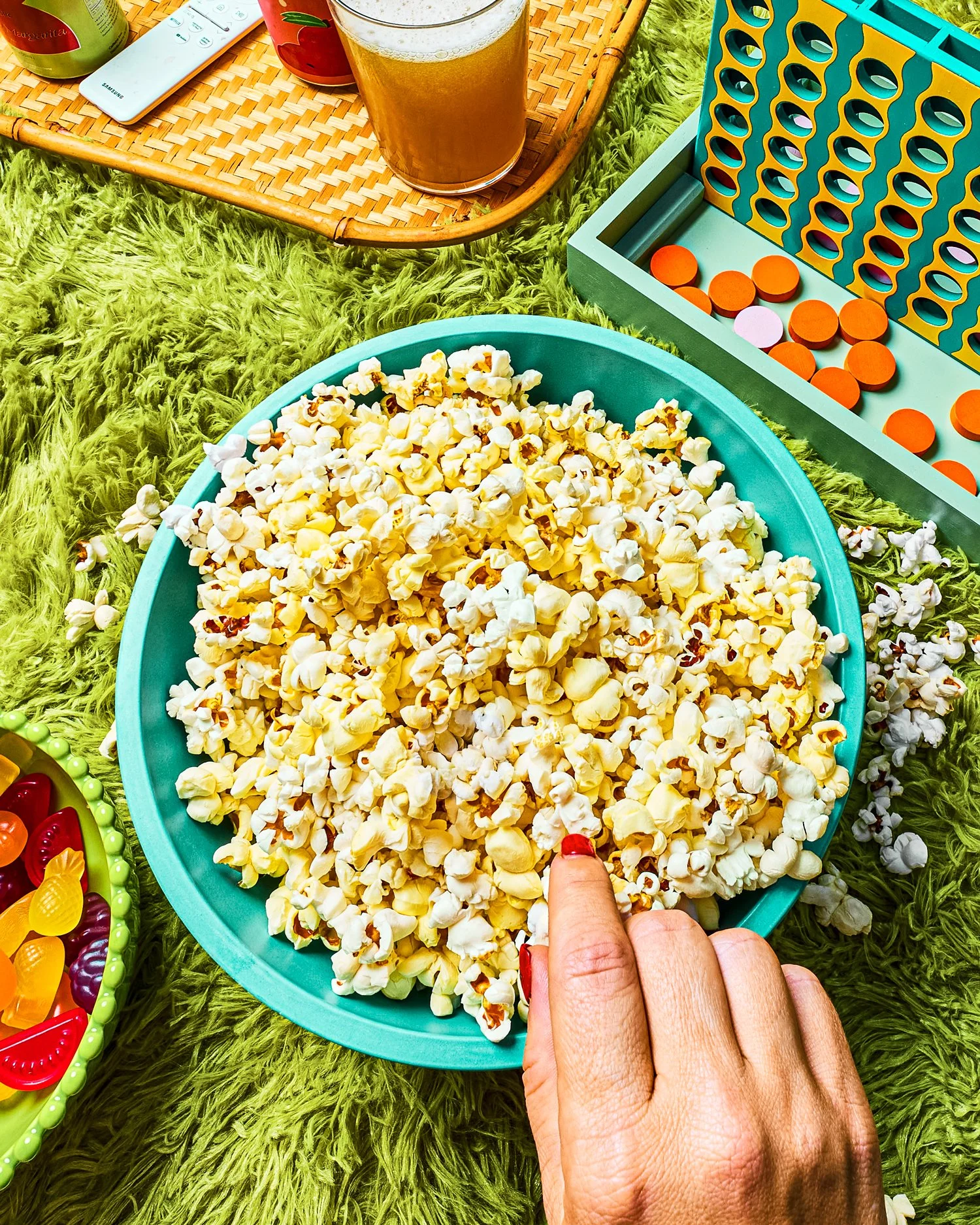Game night with a big bowl of popcorn, beers, candy, and games / Shot by Food and Beverage Photographer Ali Redmond