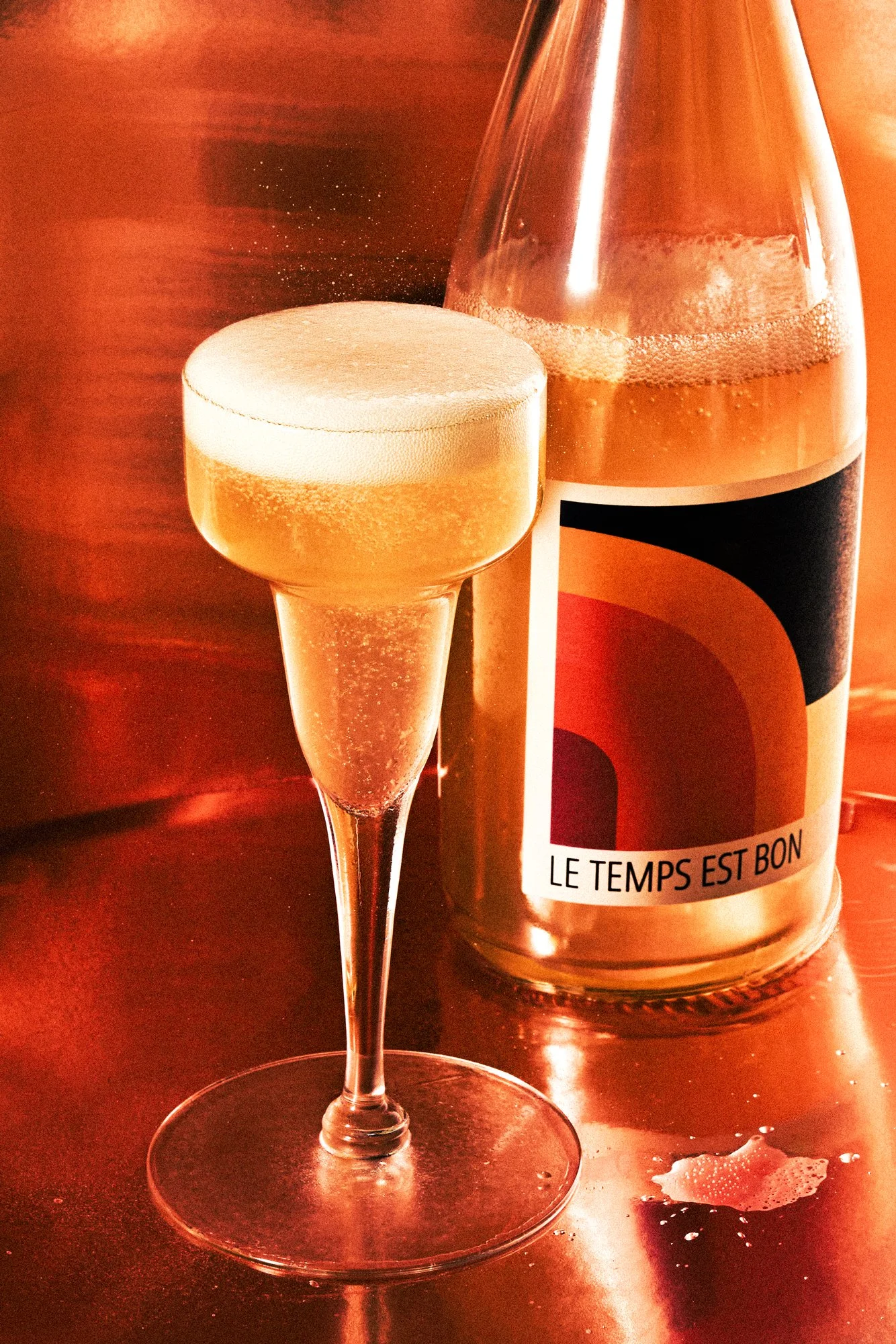 Commercial Wine Product Photography of a flute glass of sparkling and a bottle shot by Ali Redmond