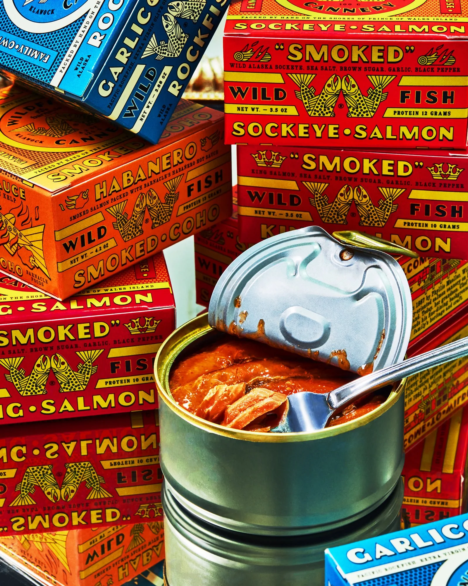 commercial food product photo tinned fish cans with fork / shot by commercial brand food photographer Ali Redmond