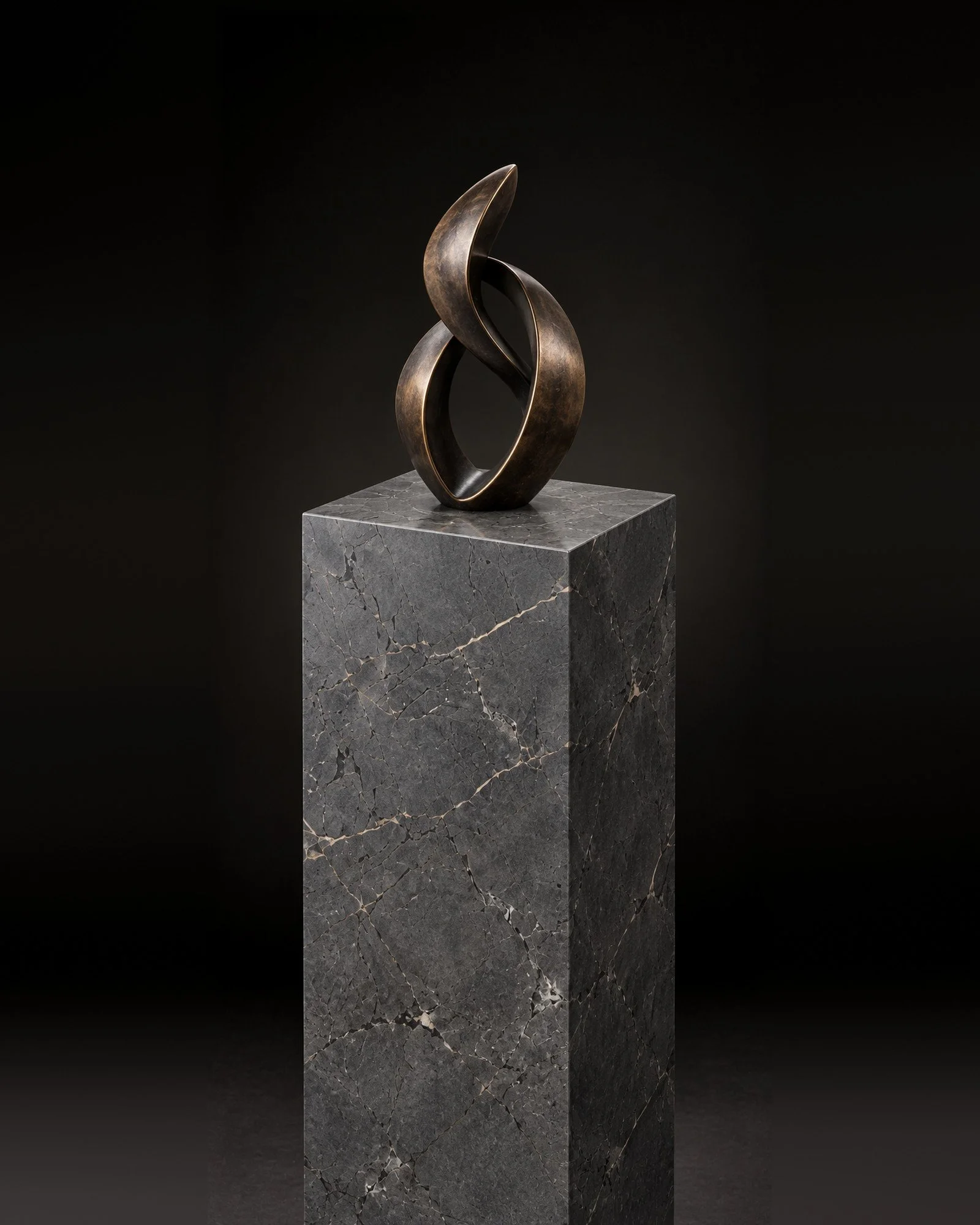 Tall dark stone pedestal, 10 x 10 x 40 inches, angle view