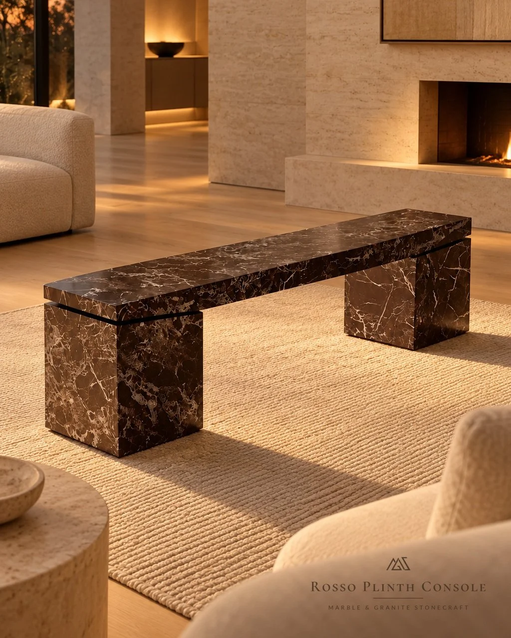 Rosso Plinth Console in red marble beside a fireplace
