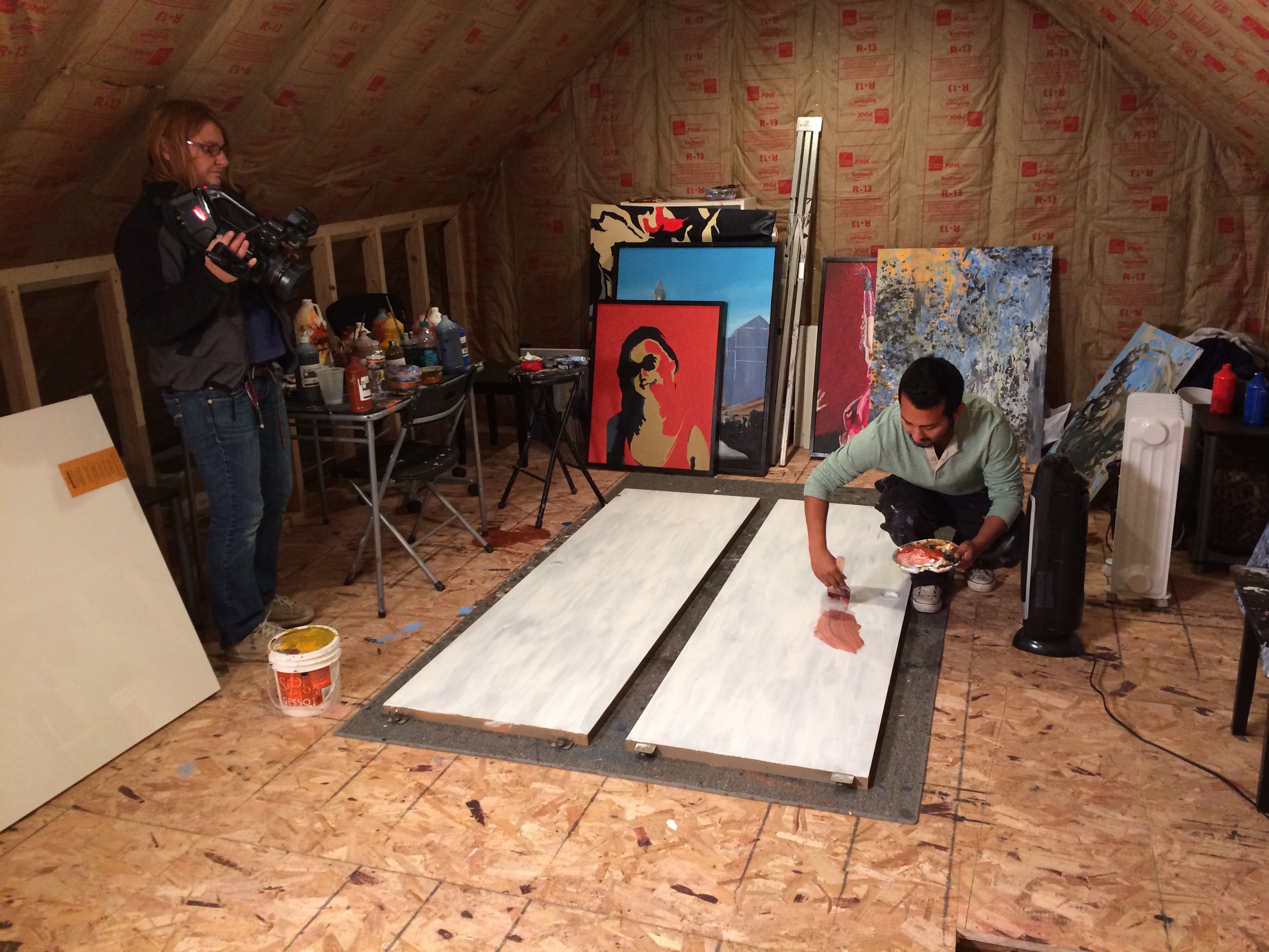 Paul begins laying out the custom painting he's designed for the closet doors.