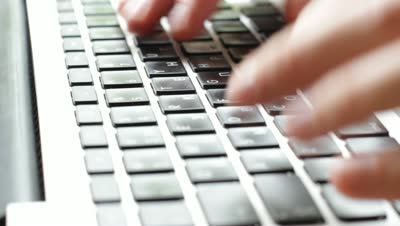 stock-footage-man-hands-typing-on-a-computer-keyboard.jpg