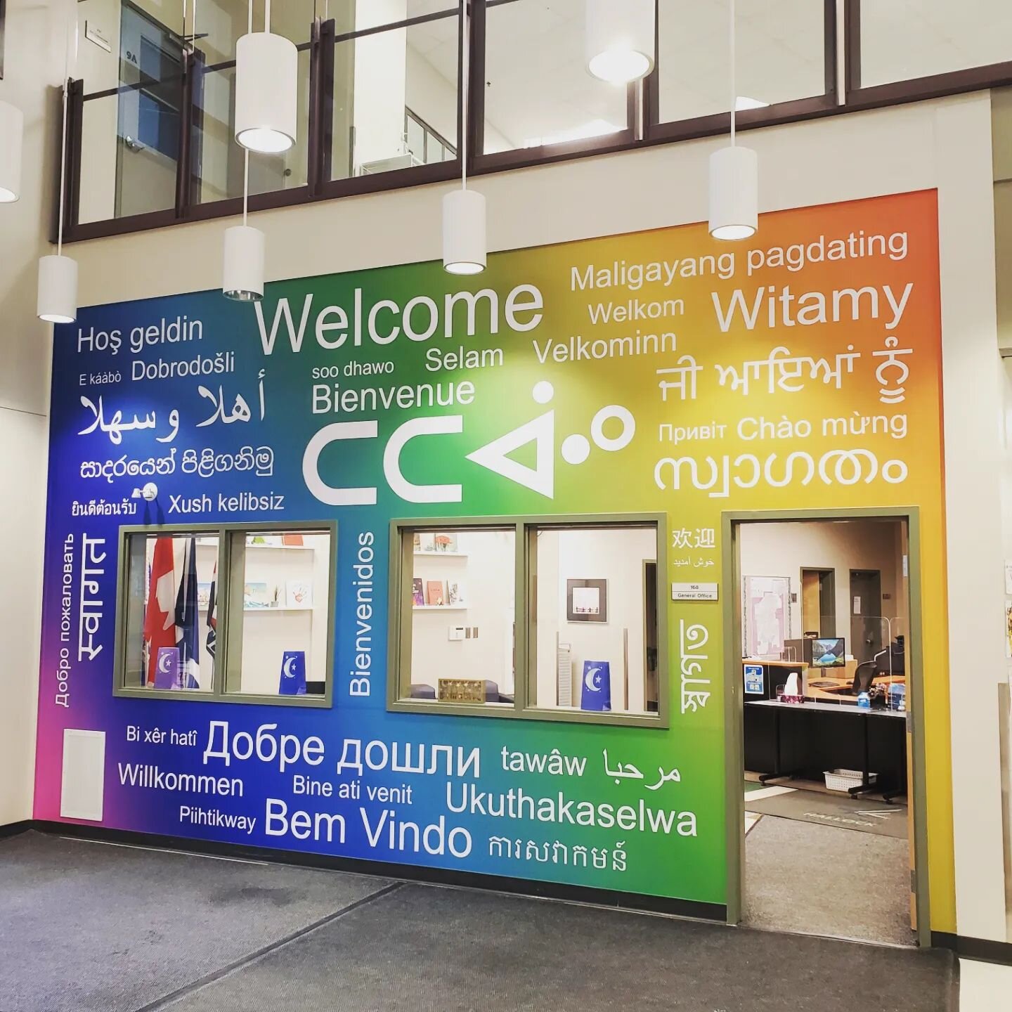 Words of Welcome wall mural! How many can you read? #wallwrap #vinylwrap #campvinyl