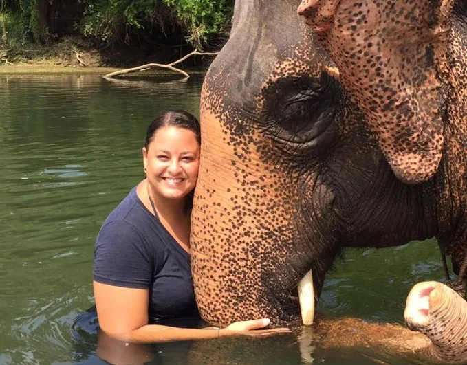 Heidi with an elephant in Thailand