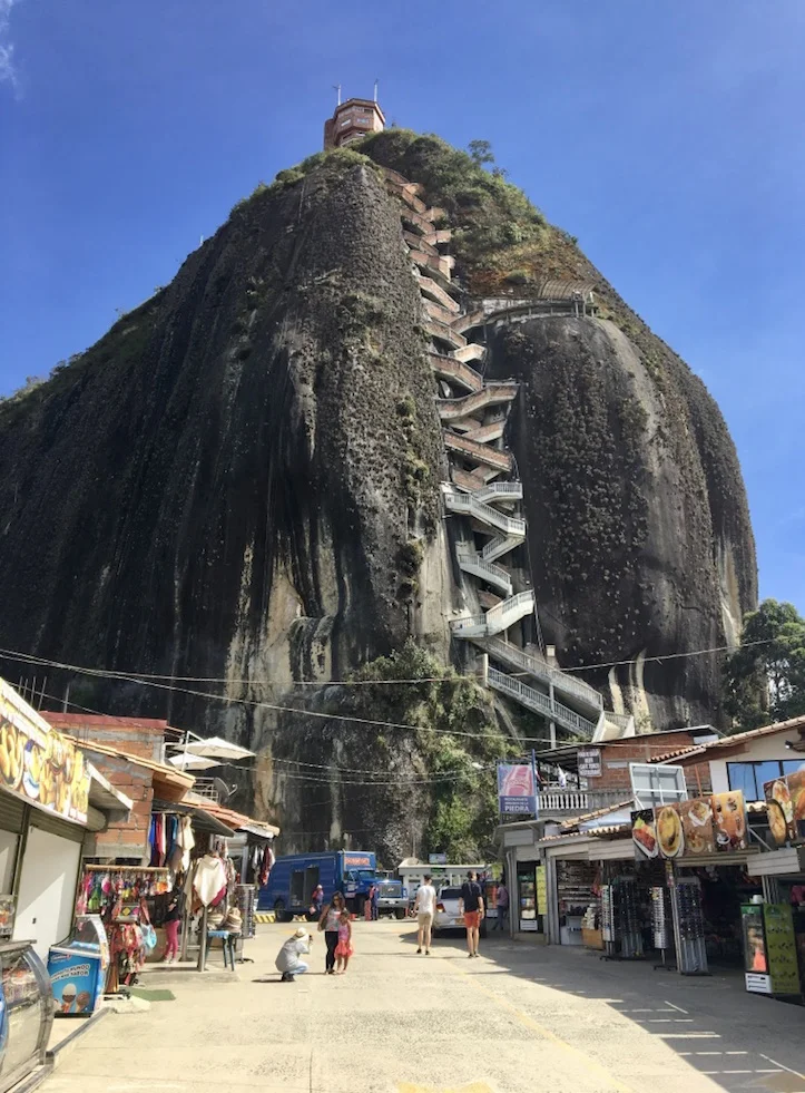 I took a day trip from Medellín to Guatapé to see El Peñón de Guatapé, the giant rock. It's only 600+ stairs to the top! When our tour guide suggested we could climb it in about 10 minutes I was skeptical… but I survived! And then took a much needed rest at the top. :)