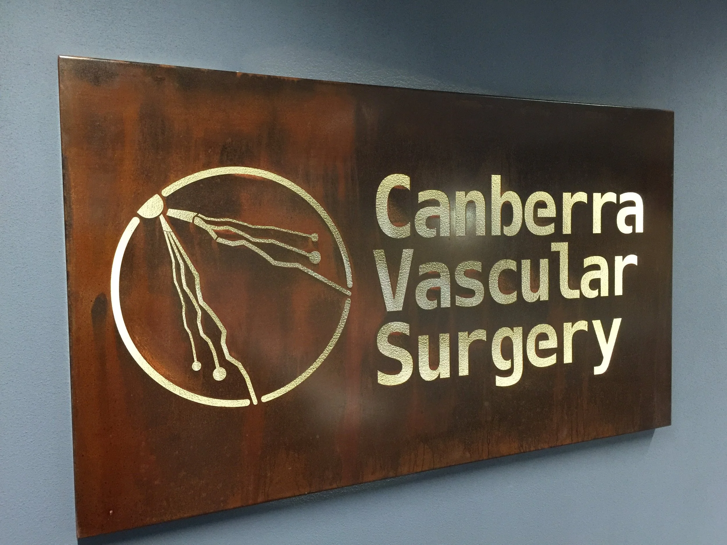 Corten backlight corporate signage.