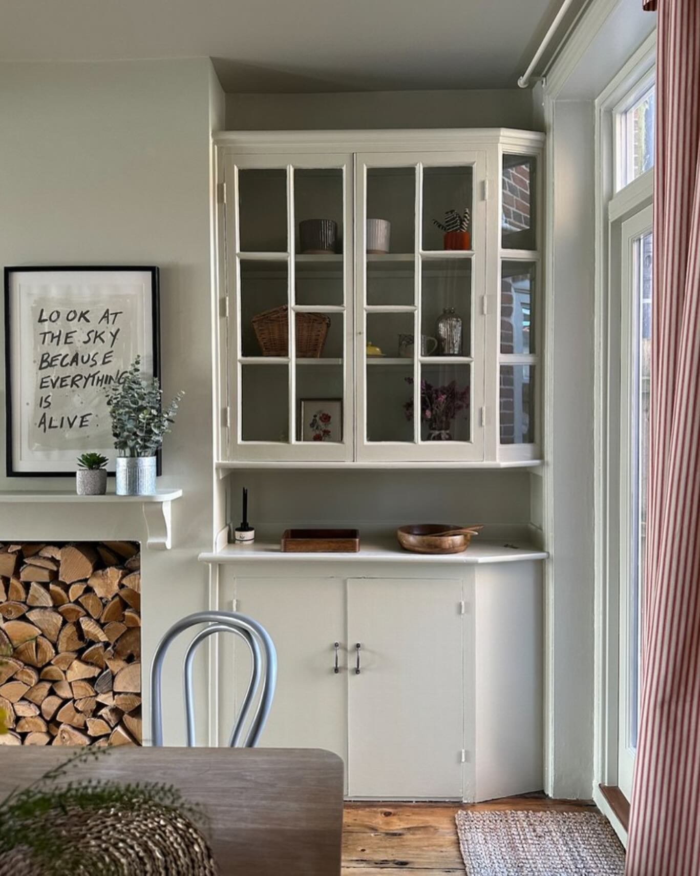 DINING &bull; dining @thenedsouthwold. Decorative built in joinery either side of the chimney breast displays little treasures and collected items, whilst the chimney area provides a handy log store for the log burner. Gorgeous red ticking curtain fr