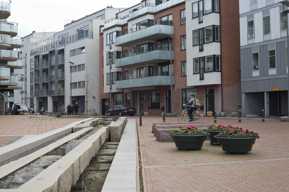  Five-story apartment buildings line the larger public spaces leading to the waterfront. Cars are welcome as slow-moving guests in pedestrian and bike-friendly territory.   