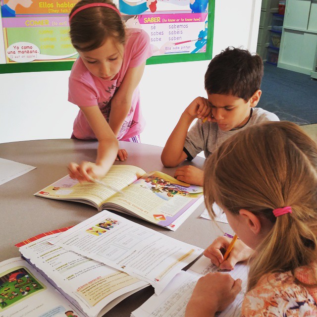 Reading and writing about the story of La Familia Singular today at #vipkids