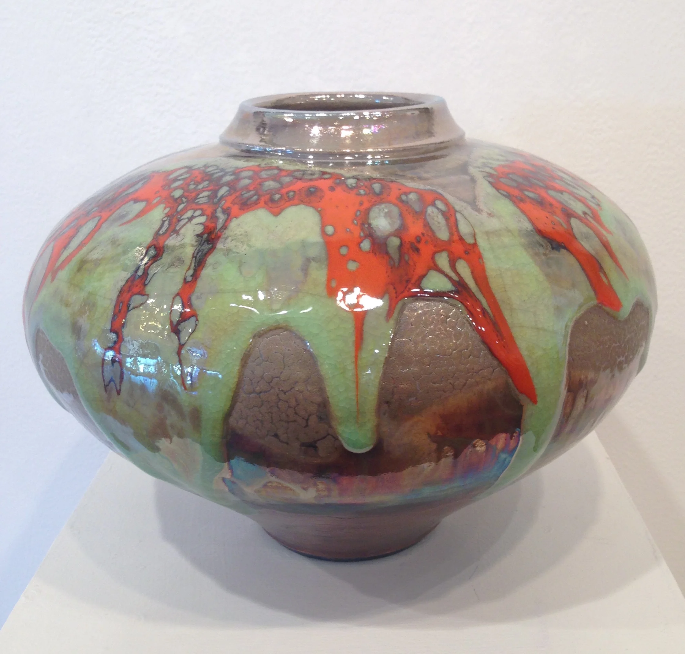 Light Green and Red Vessel